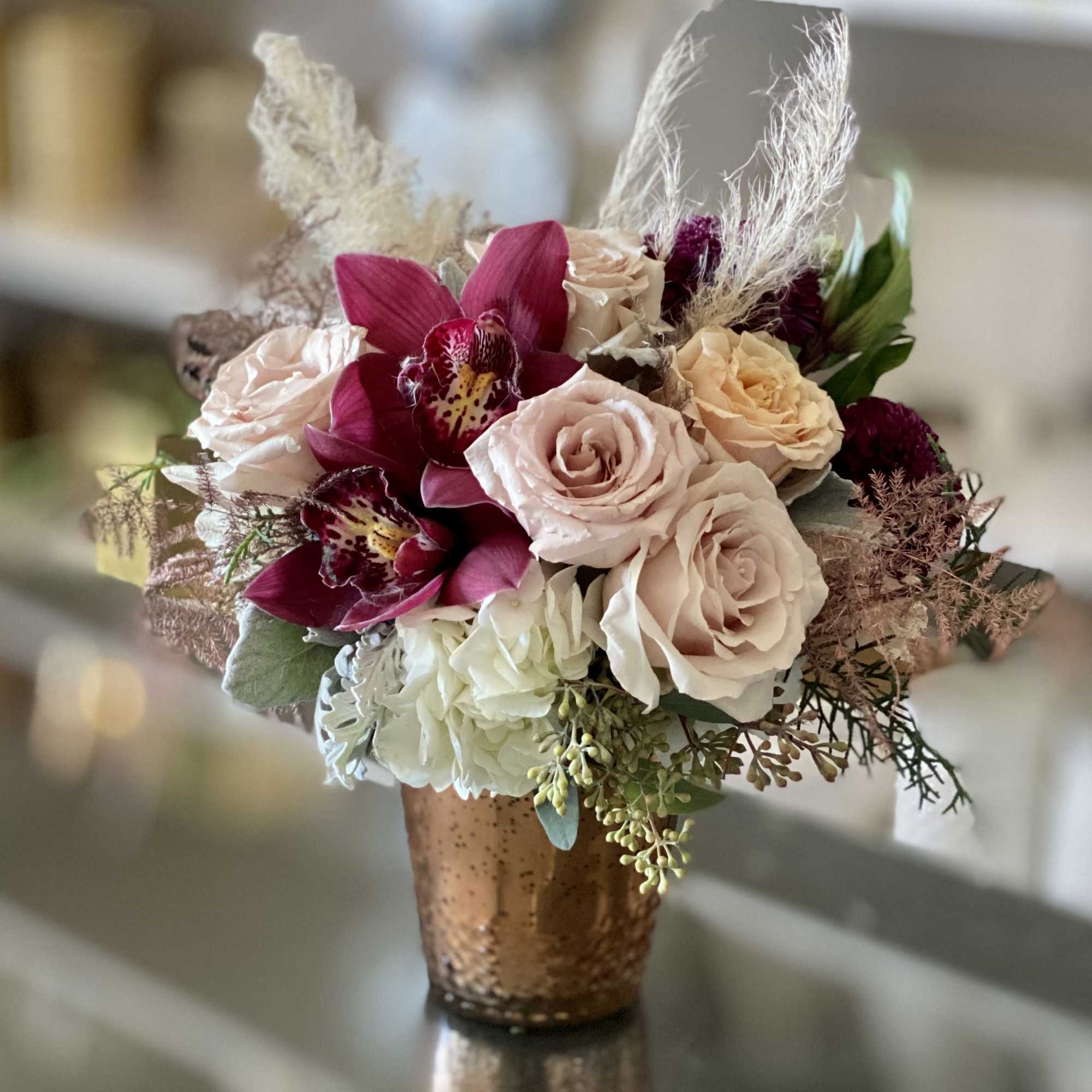 Meet Halo, an elegant floral arrangement designed to feel soft, radiant, and