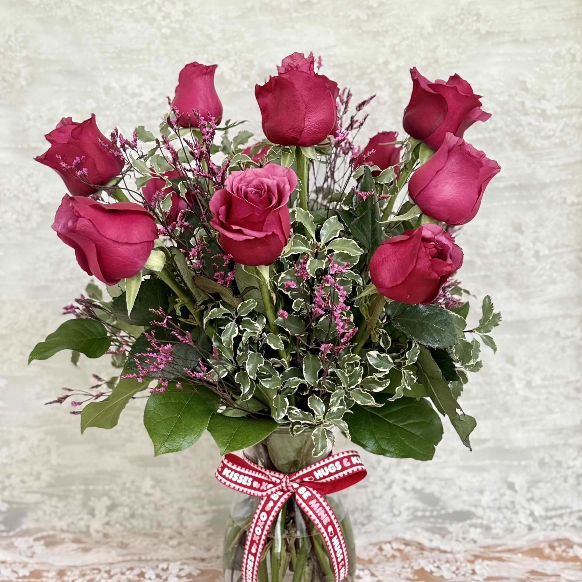 One dozen burgundy/wine color roses

Great for any occasion 