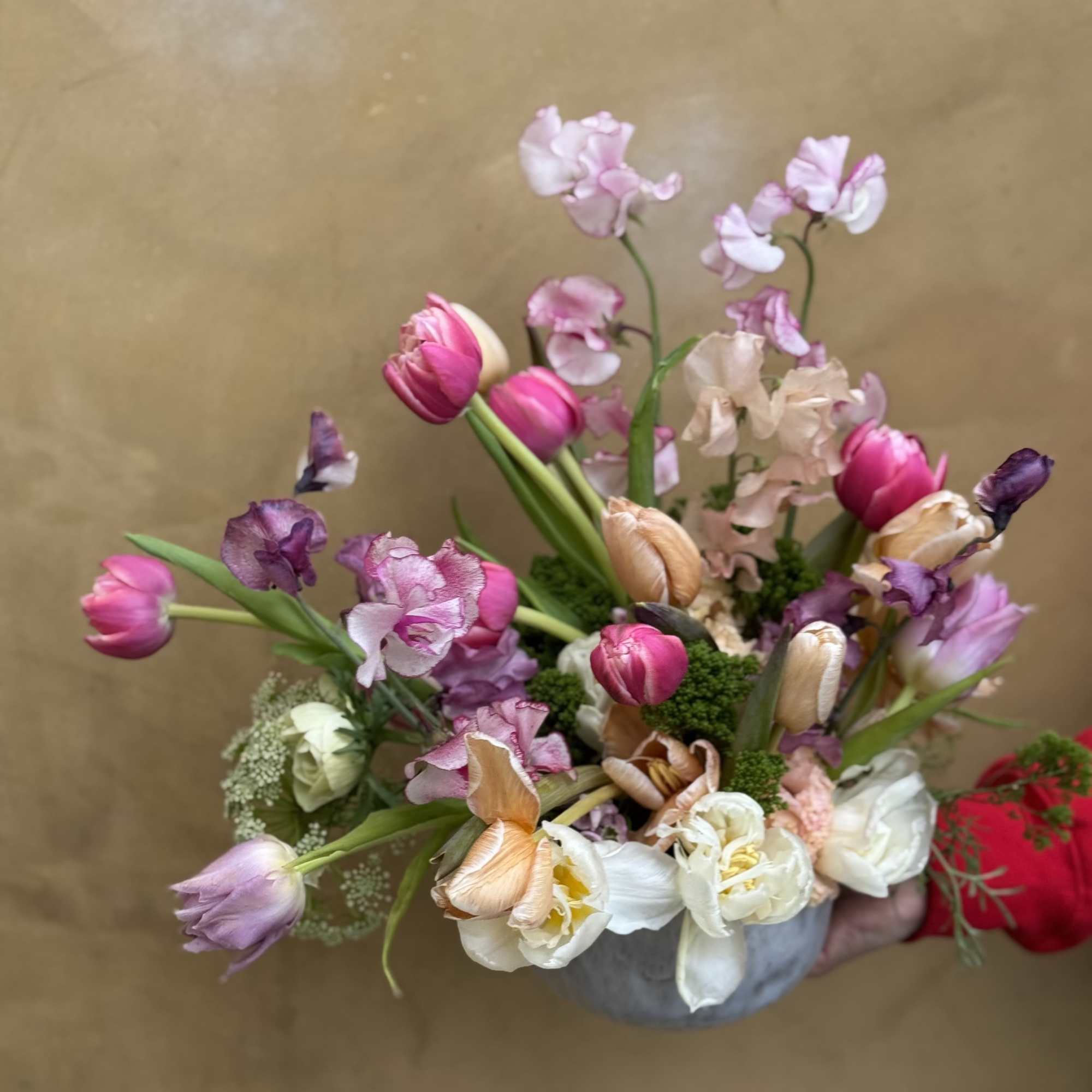 Dainty arrangement comprised of the most majestic blooms, emphasizing tuips and sweet