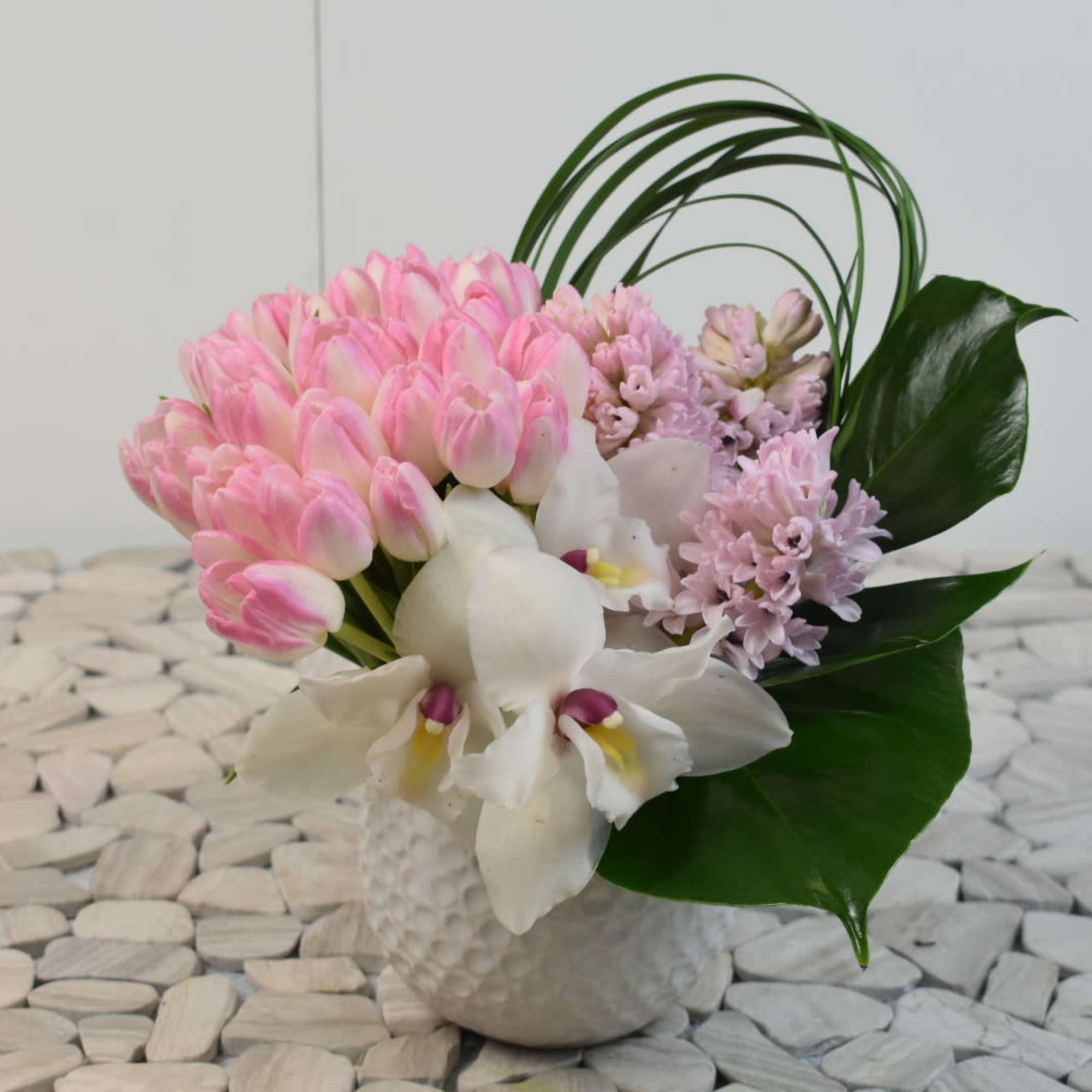 This English princess comes in a lovely white vase
with pink tulips, white