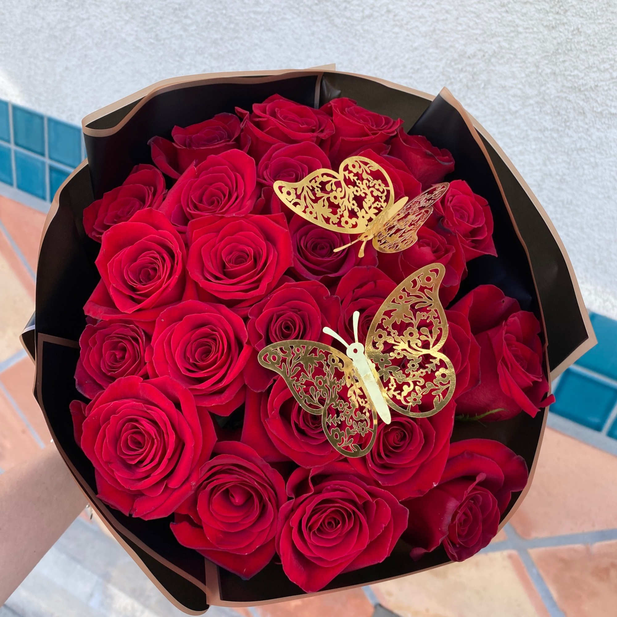 Wrapped roses bouquet is perfect to hand to someone on her birthday