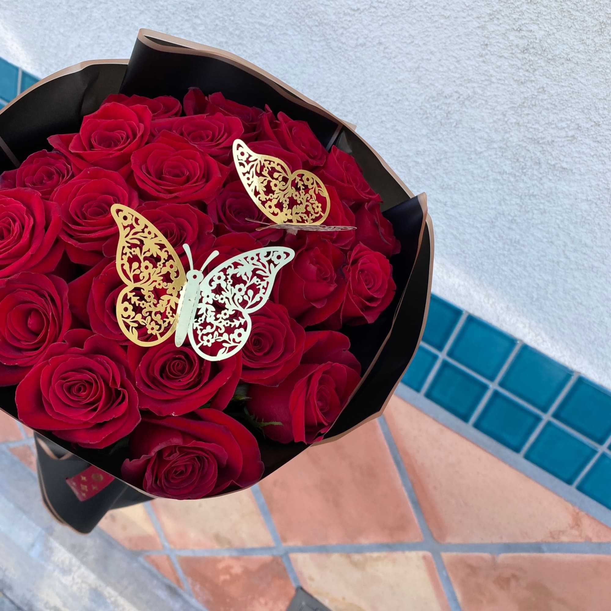 Wrapped roses bouquet is perfect to hand to someone on her birthday