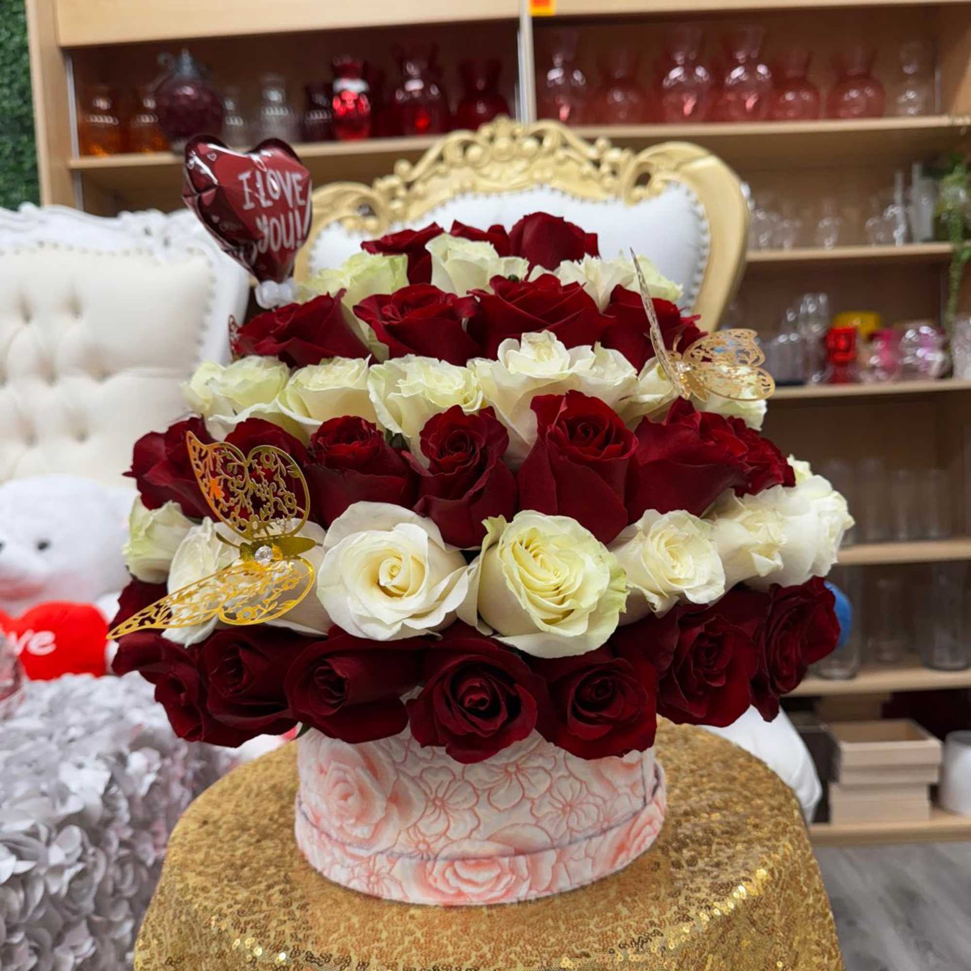 Arrangement of roses on a flower arrangement box