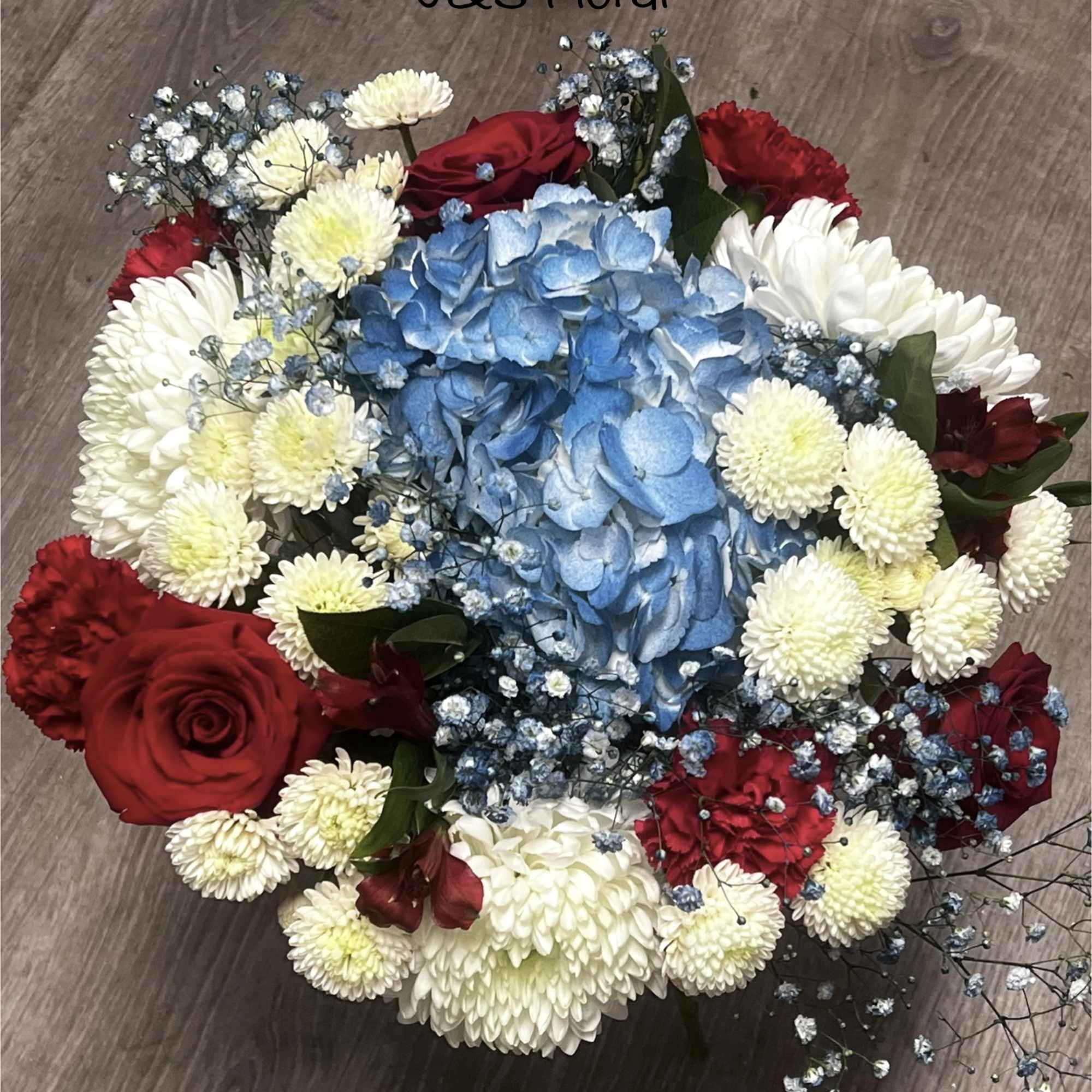Introducing our design Freedom Flowers! Beautifully arranged with roses, carnation, mums, Alstro