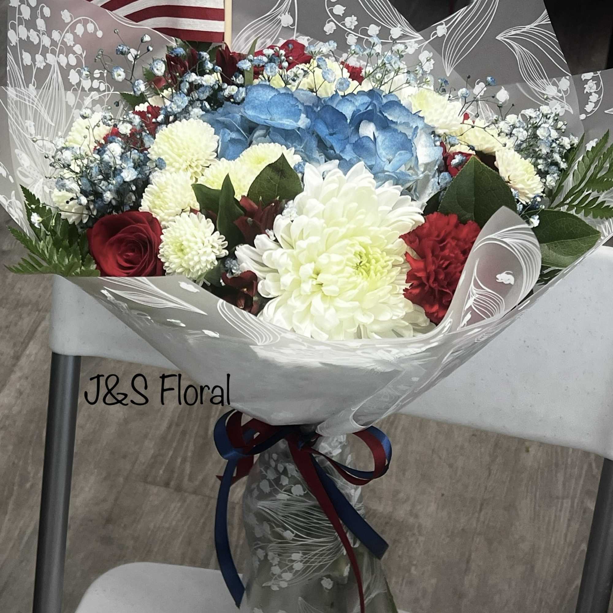 Introducing our design Freedom Flowers! Beautifully arranged with roses, carnation, mums, Alstro