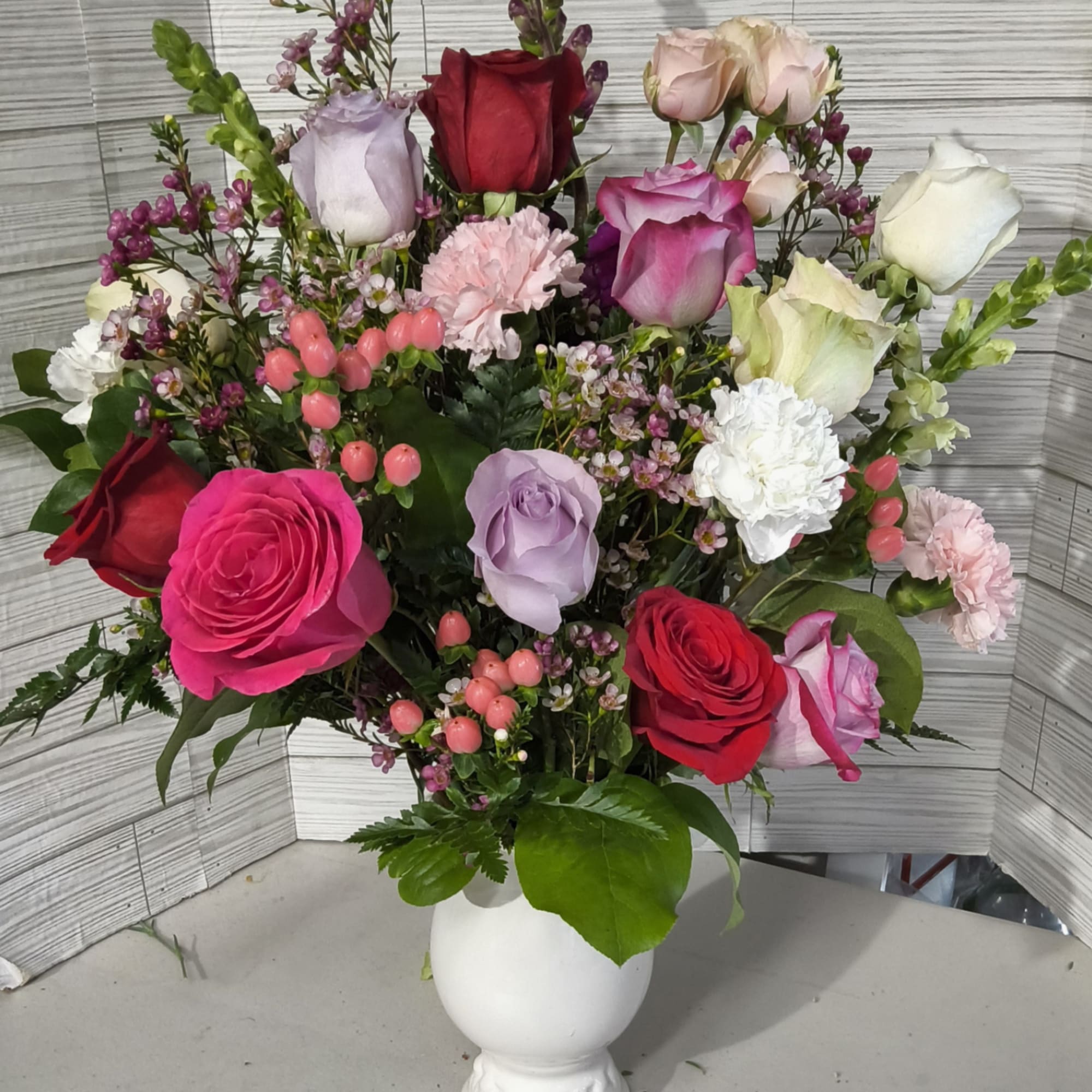 Mix of Valentine colors of different florals starting with 6 roses for