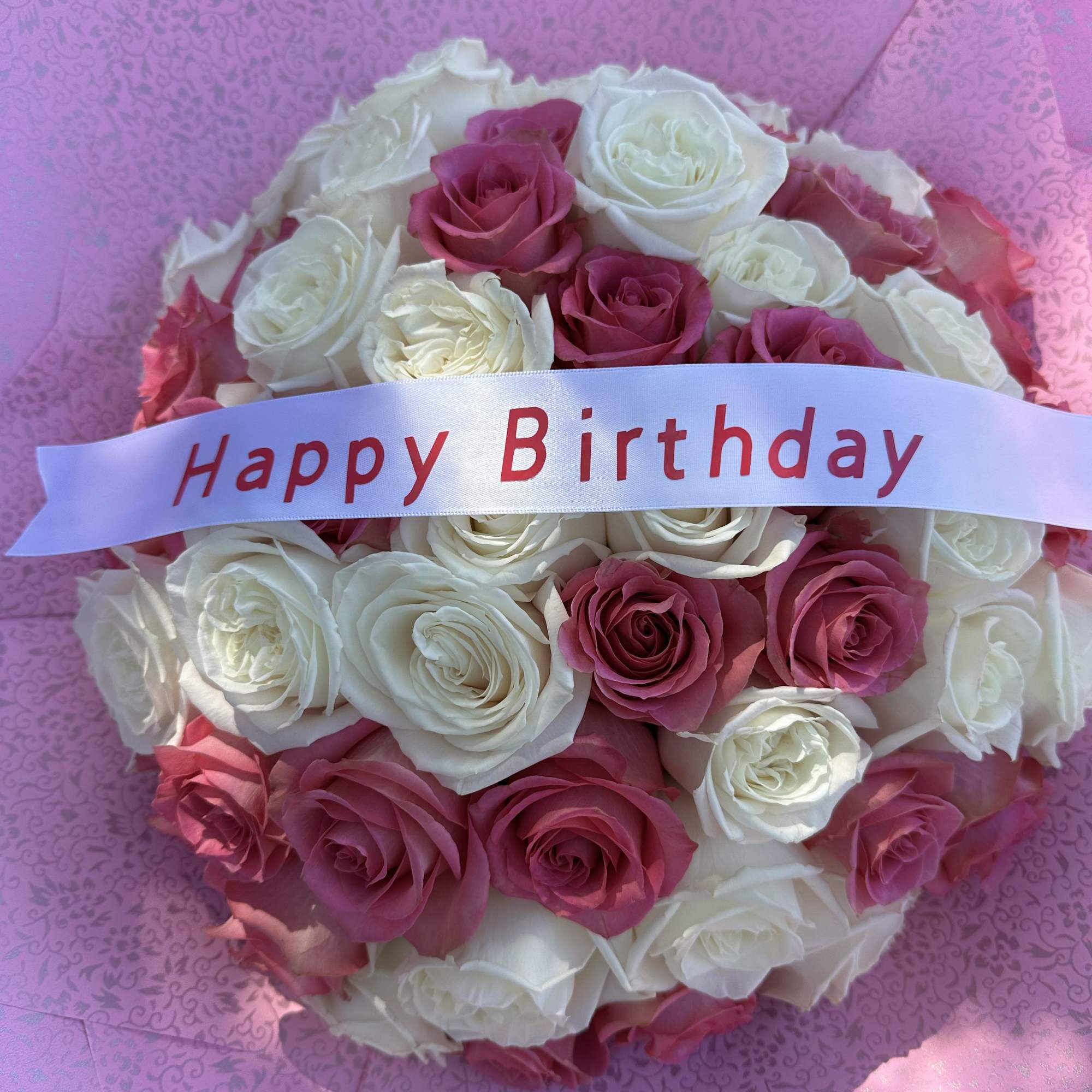 Standard 35 roses
Deluxe 50 roses (picture)
Does not include a vase
Banner are additional