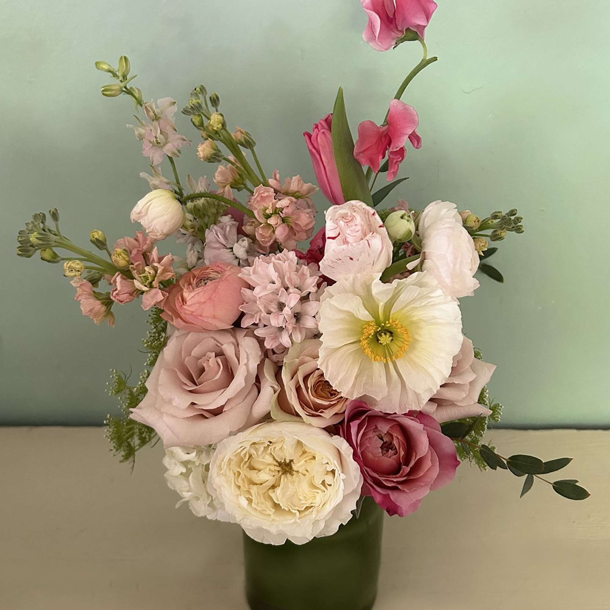 A smaller, yet super pretty arrangement placed in a smaller jar/vase (4