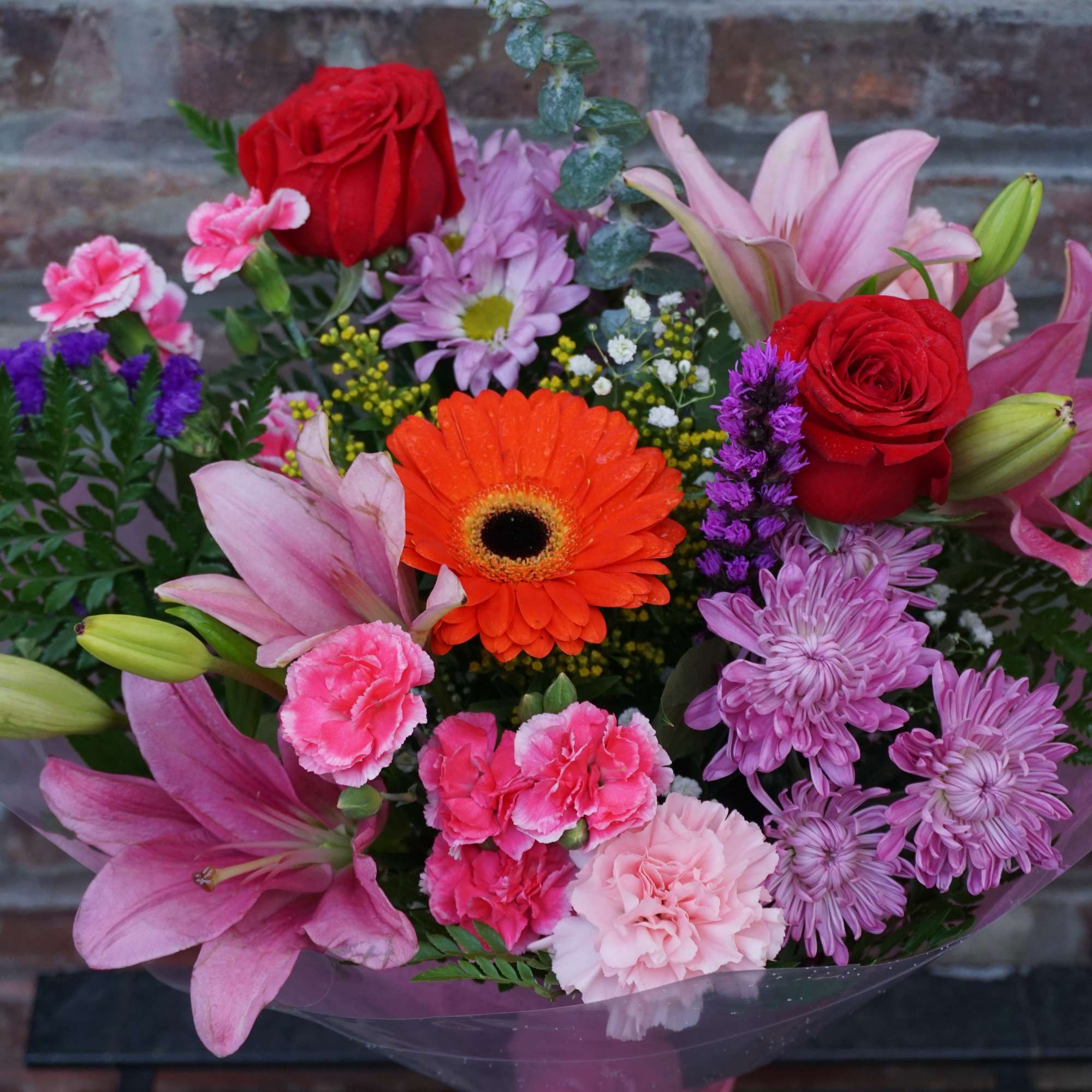 A bouquet of fresh, seasonal flowers..
*this does not come with a vase