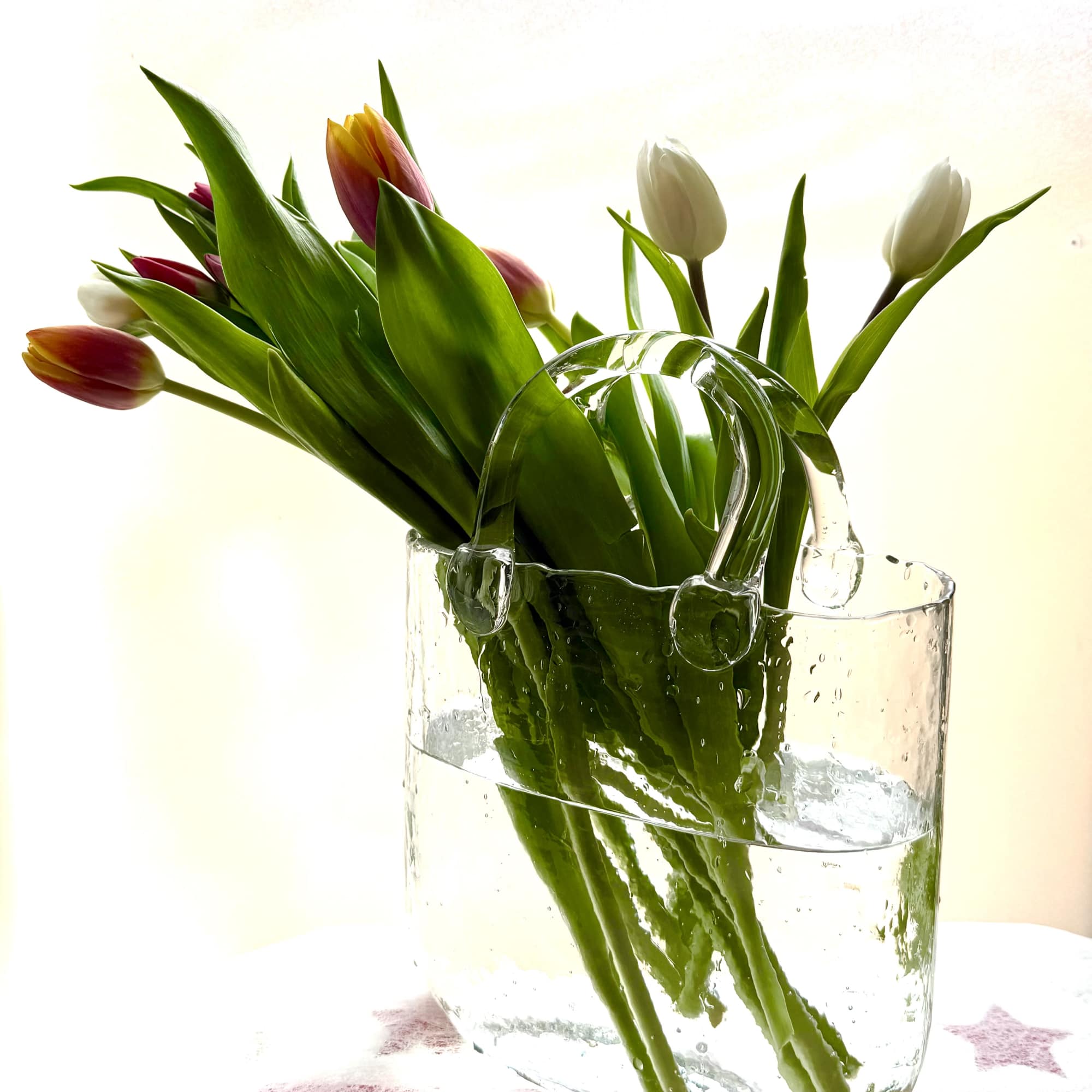 Great Mother&rsquo;s Day gift 
Mixed color Tulips in glass purse  with