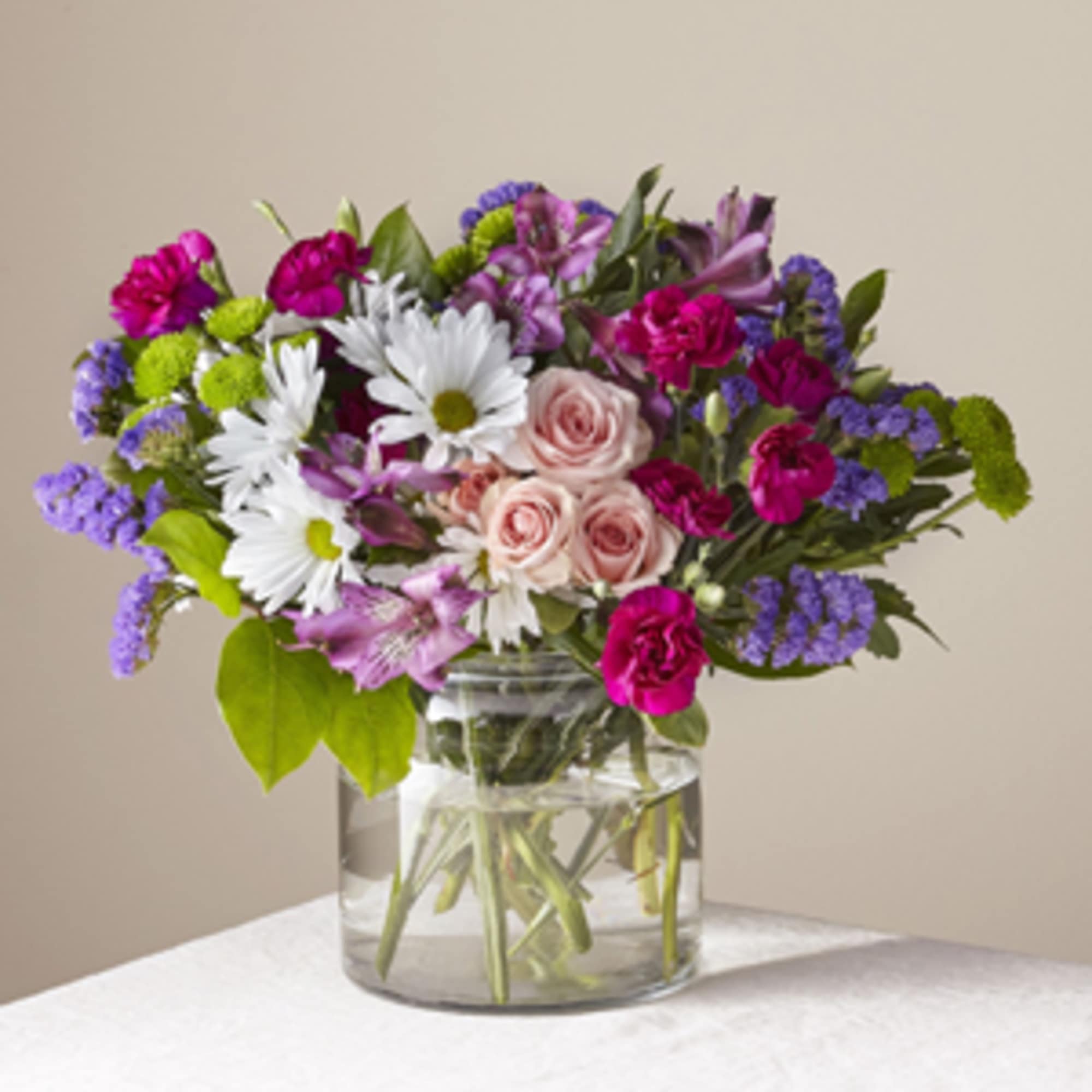 Our freshest blooms in shades of pink, green, purple and white are