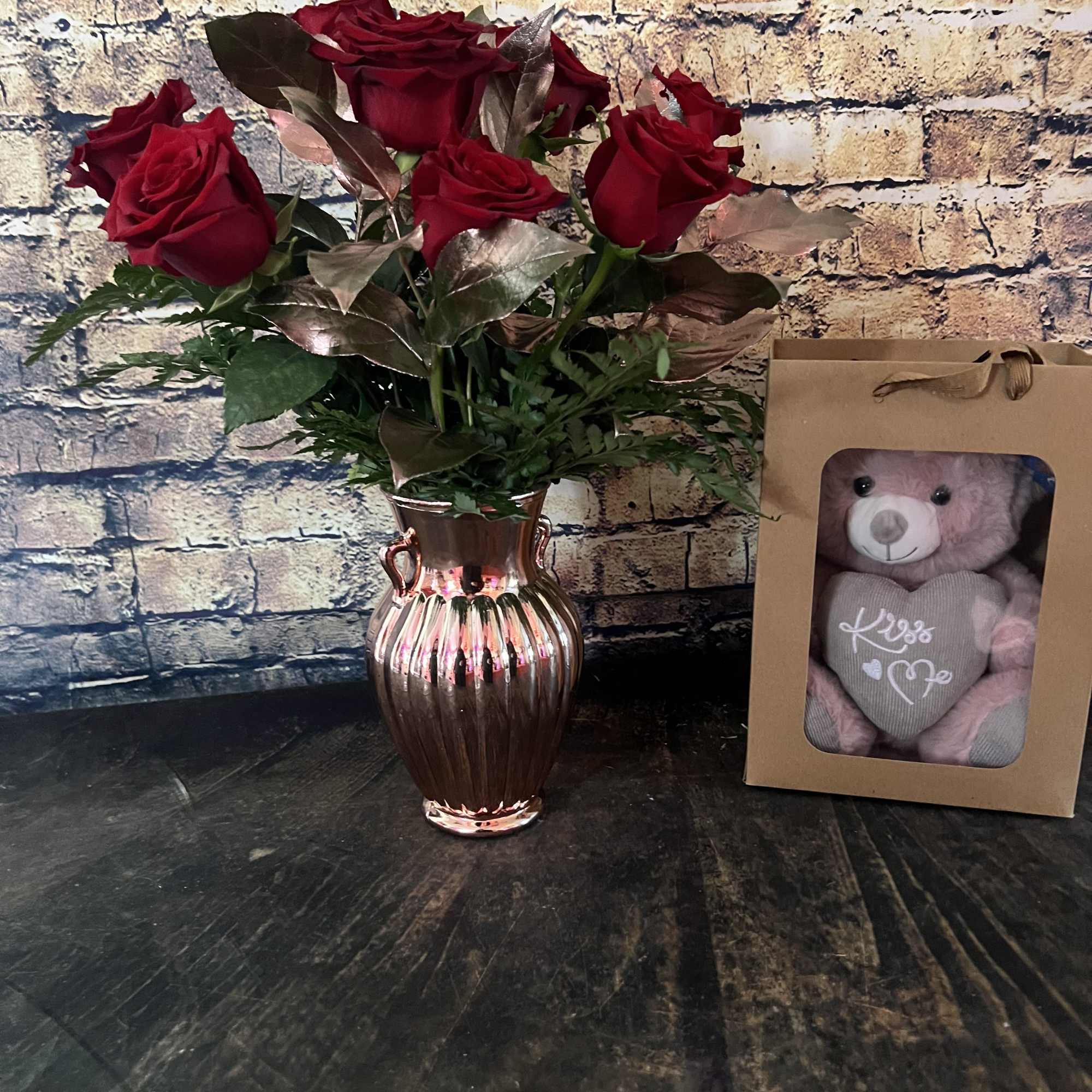 Nothing is more stunning than a classic red rose accented with Rose