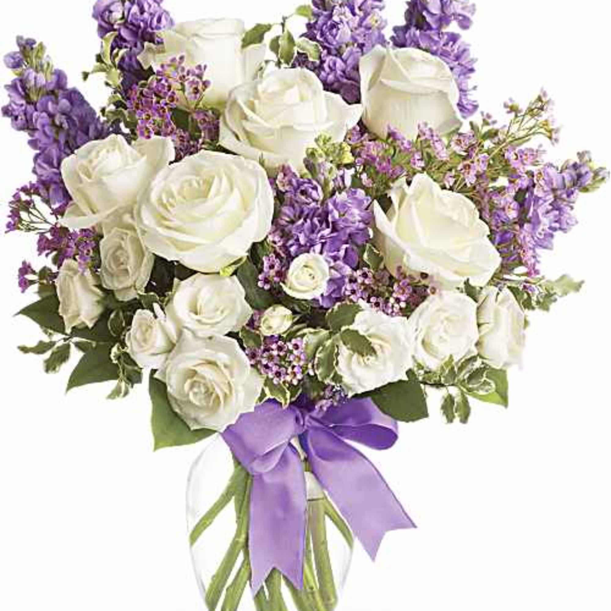 White roses and fragrant stock in lavender and purple arranged in a