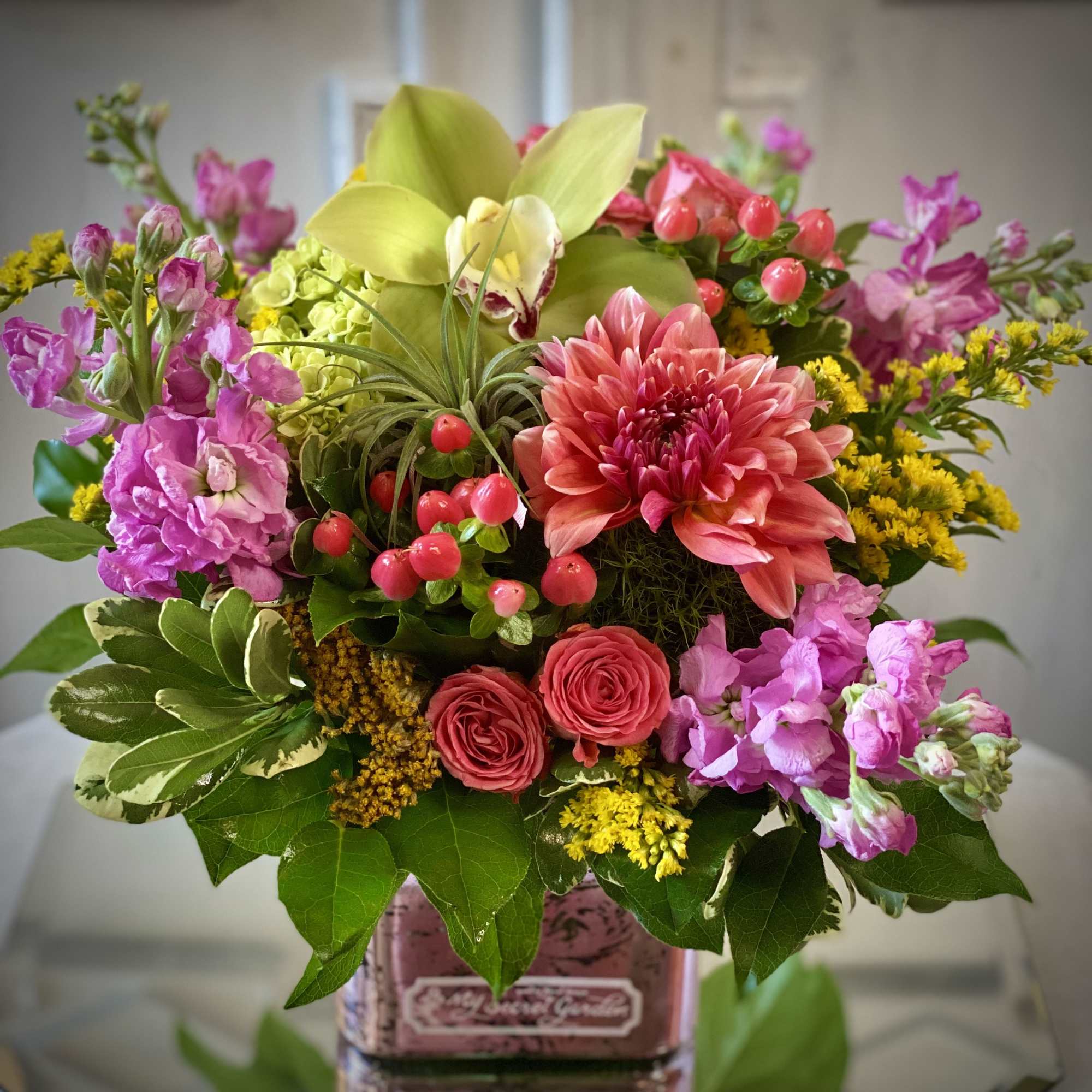 Jazzy Elegance in an array of citrus colored flowers in a lovely