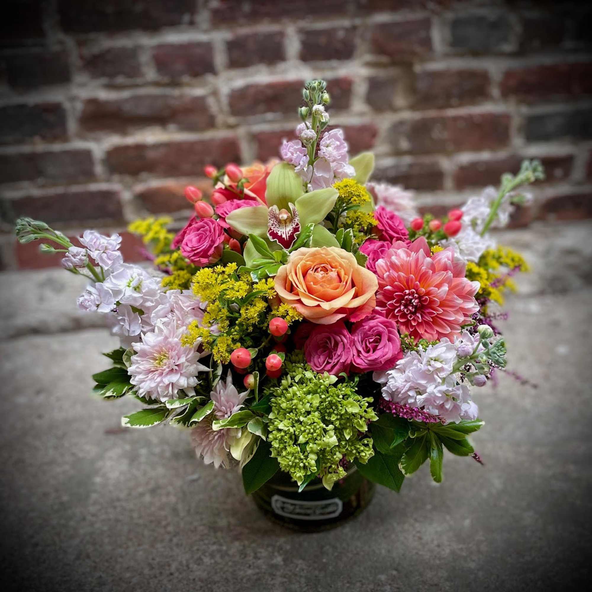 Jazzy Elegance in an array of citrus colored flowers in a lovely