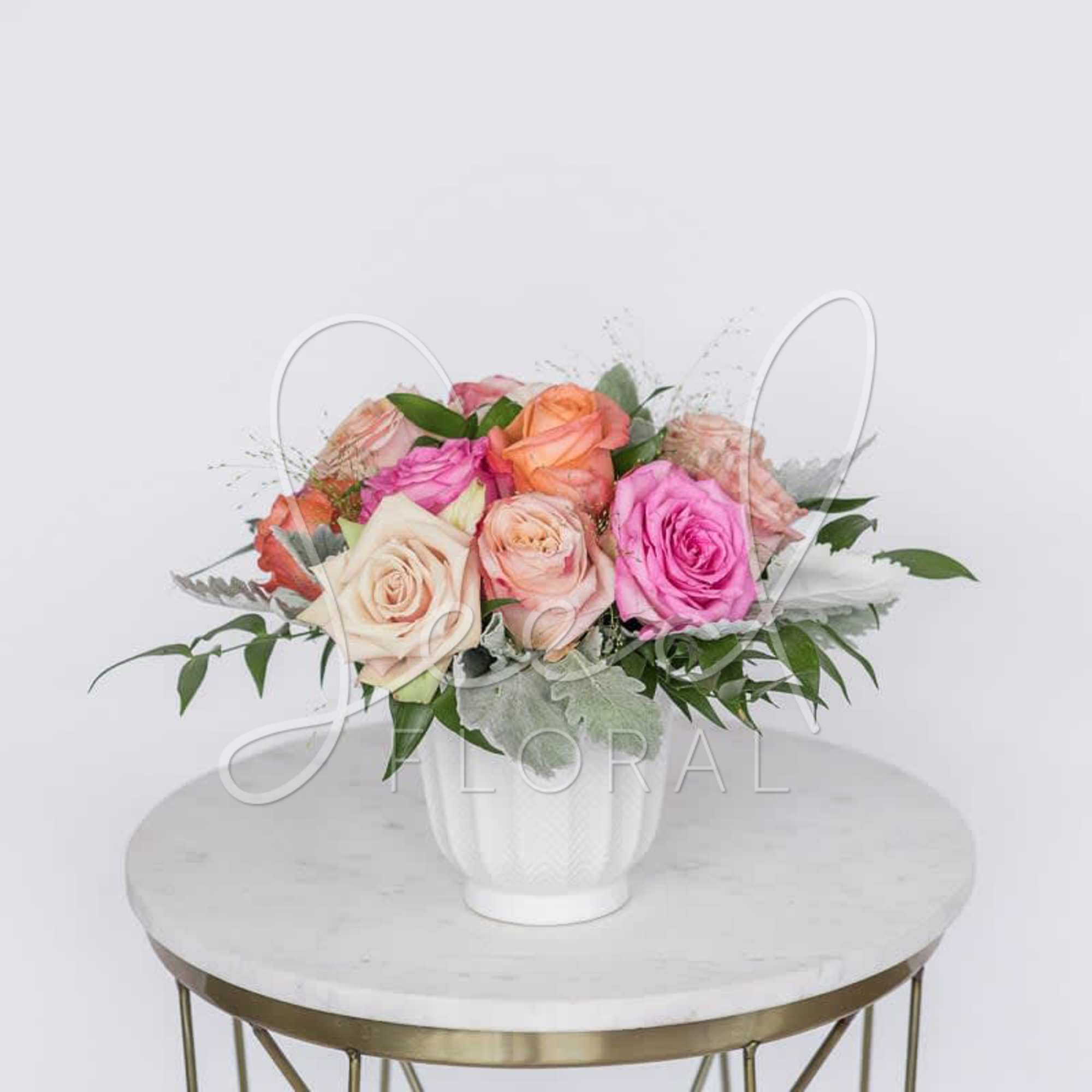 Classic roses get a summer makeover in our &ldquo;A Pretty Dozen&rdquo; arrangement