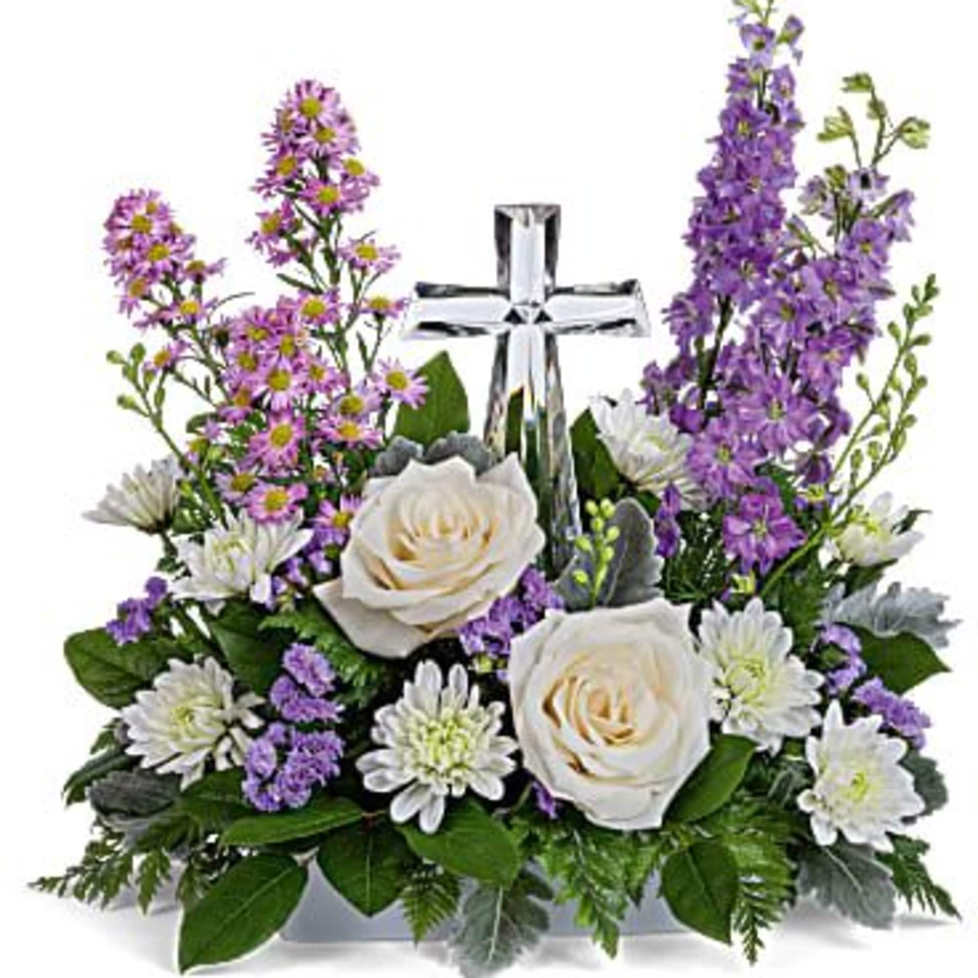 Soft and serene, this artistic array of cream and lavender blooms around