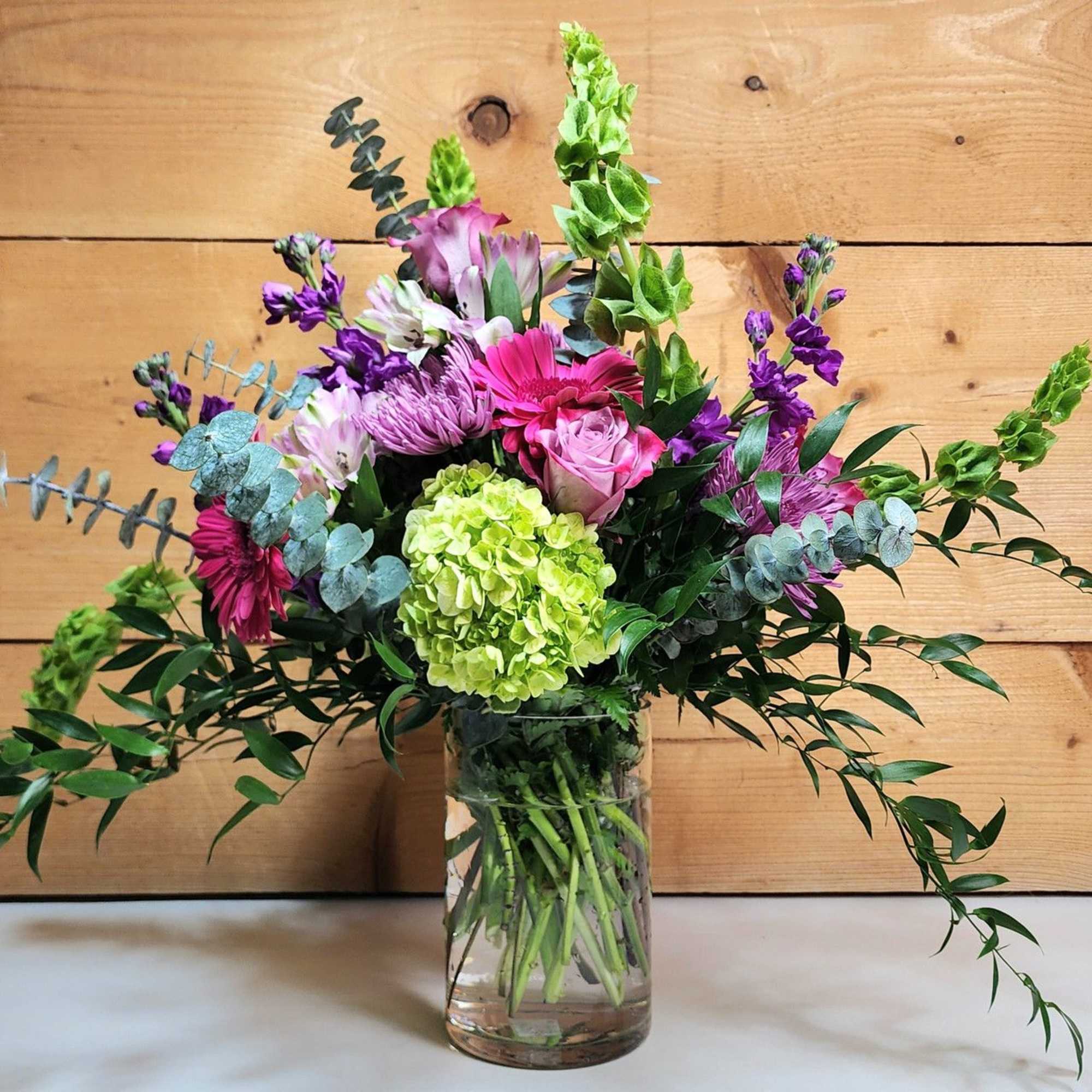 Elevate any occasion with Majestic Harmony, a luxurious bouquet that blends the