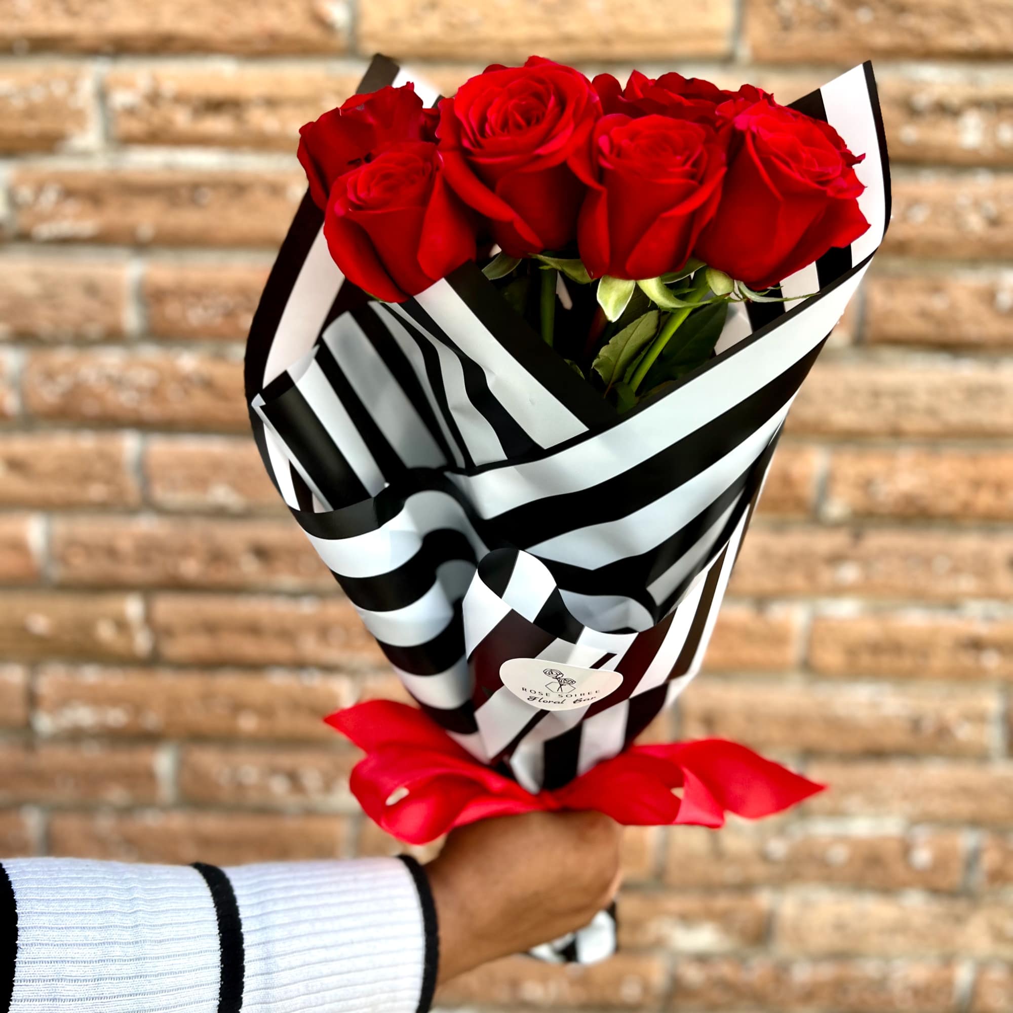 Classic Red Roses with a Rose Soiree touch of opulent black and