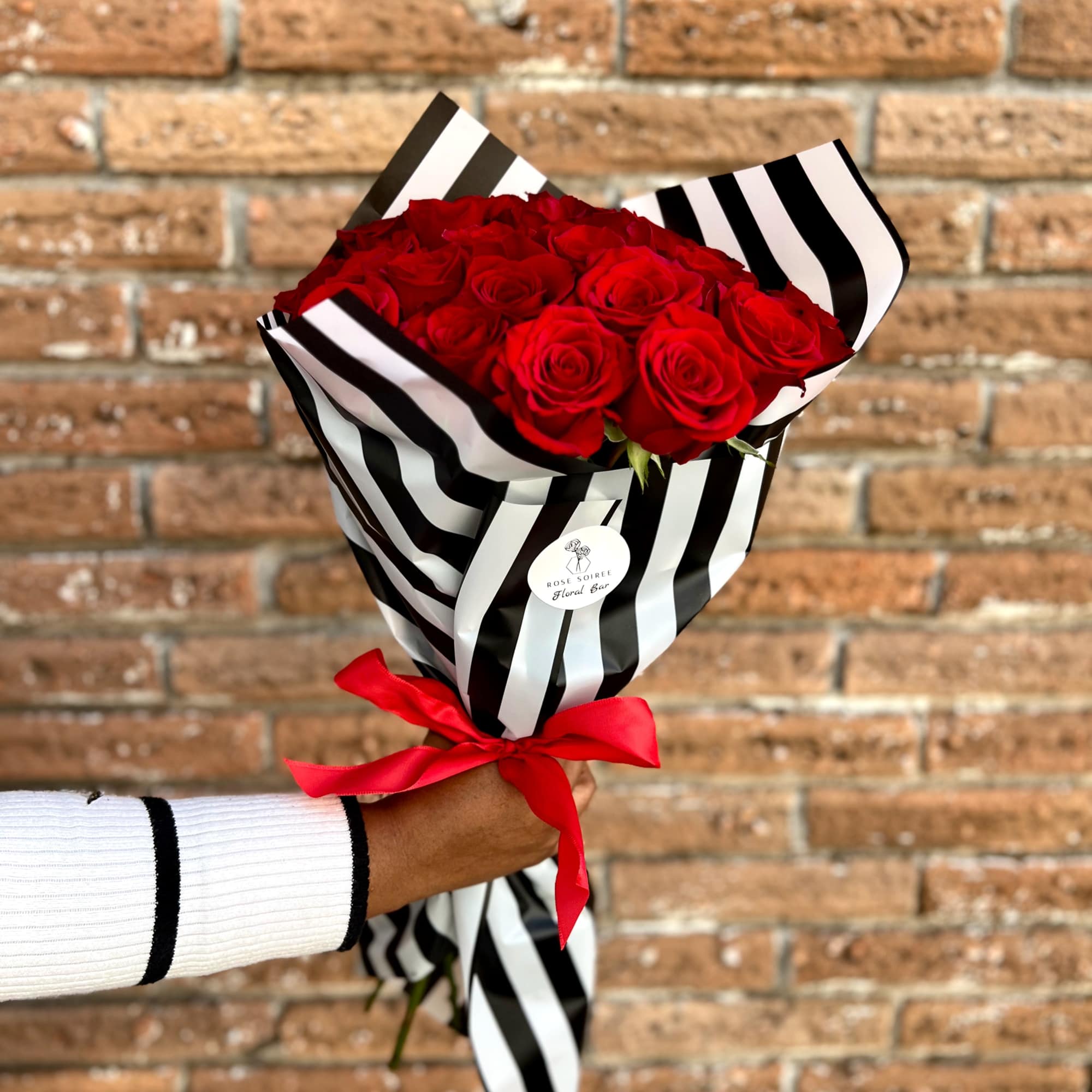 Classic Red Roses with a Rose Soiree touch of opulent black and