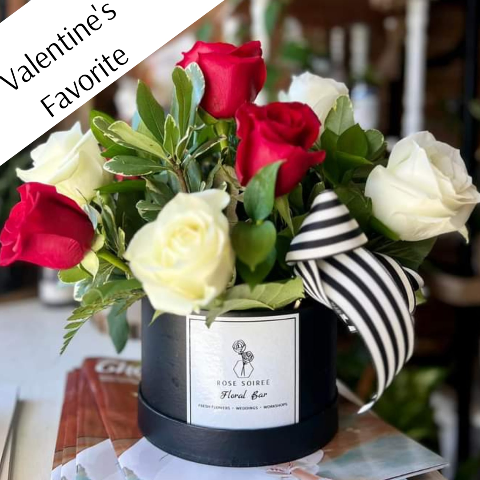 Gorgeous is an understatement! A traditional red and white rose arrangement in