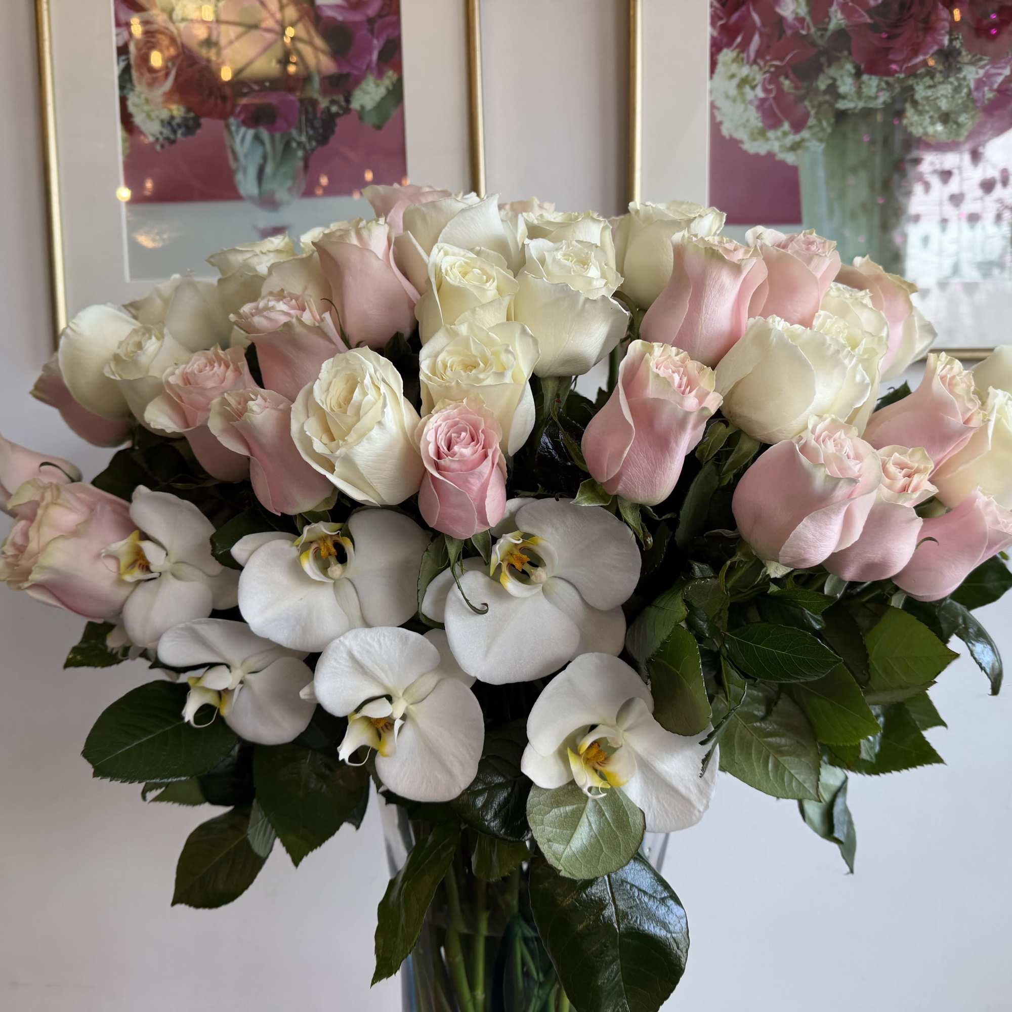Luxury vase with a favorite touch of pink and white roses, perfectly
