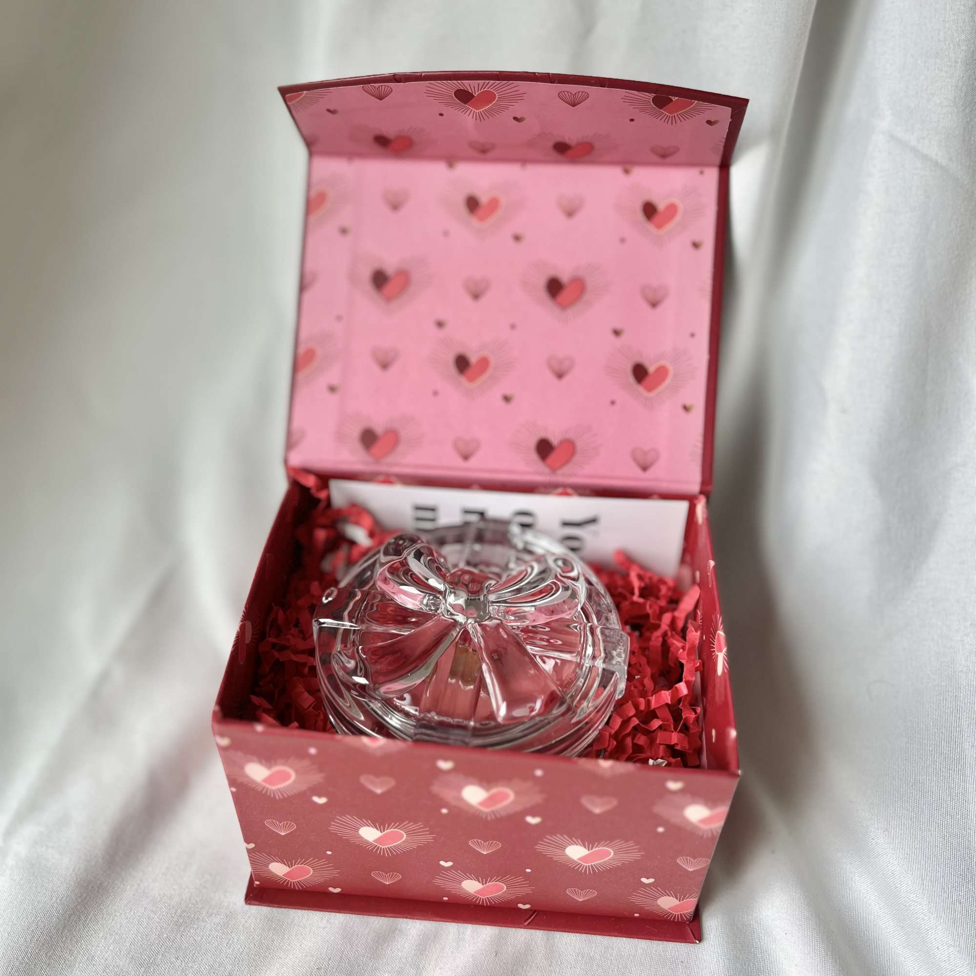 This box features a handmade Valentine's themed candle. Candle and box color
