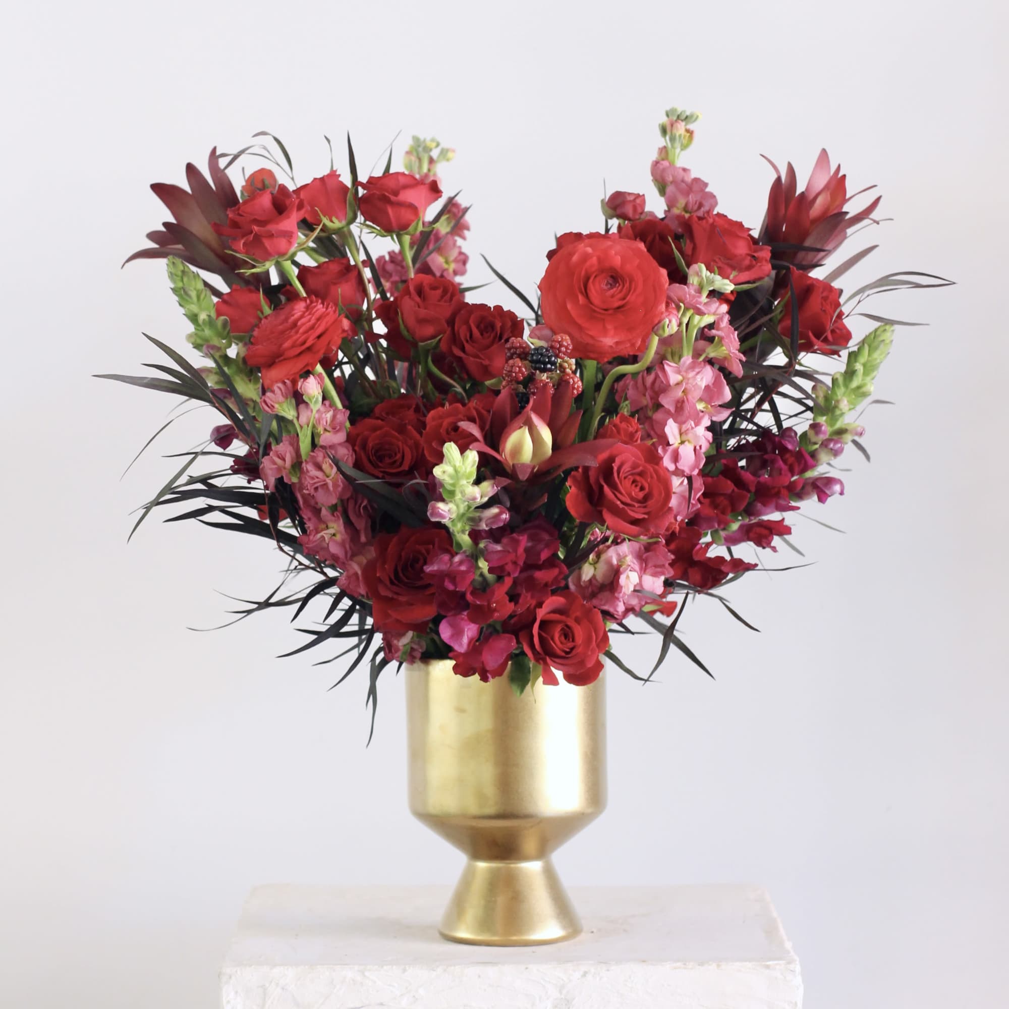 Bold, romantic, and full of drama, the Rouge floral arrangement is a