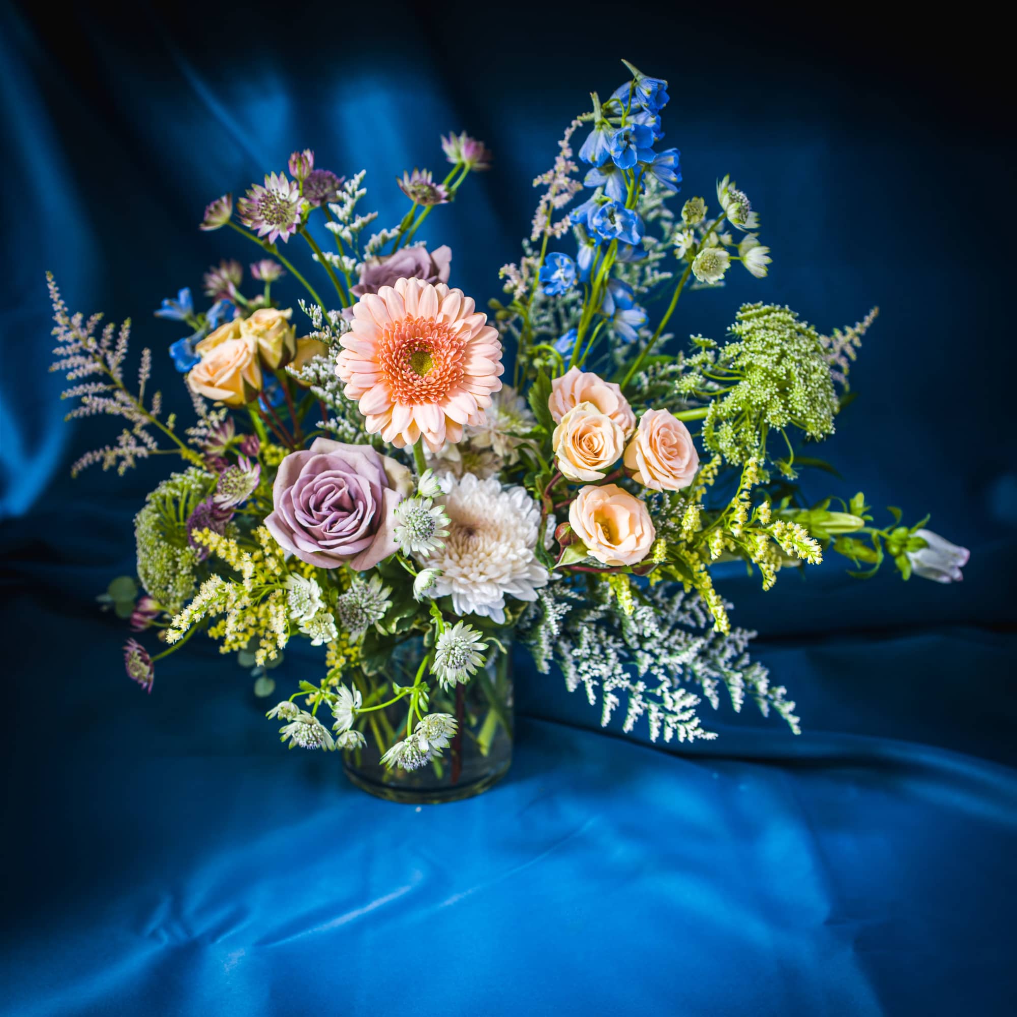 Soft hues of peachy pink, buttery yellow and lavender are the stars