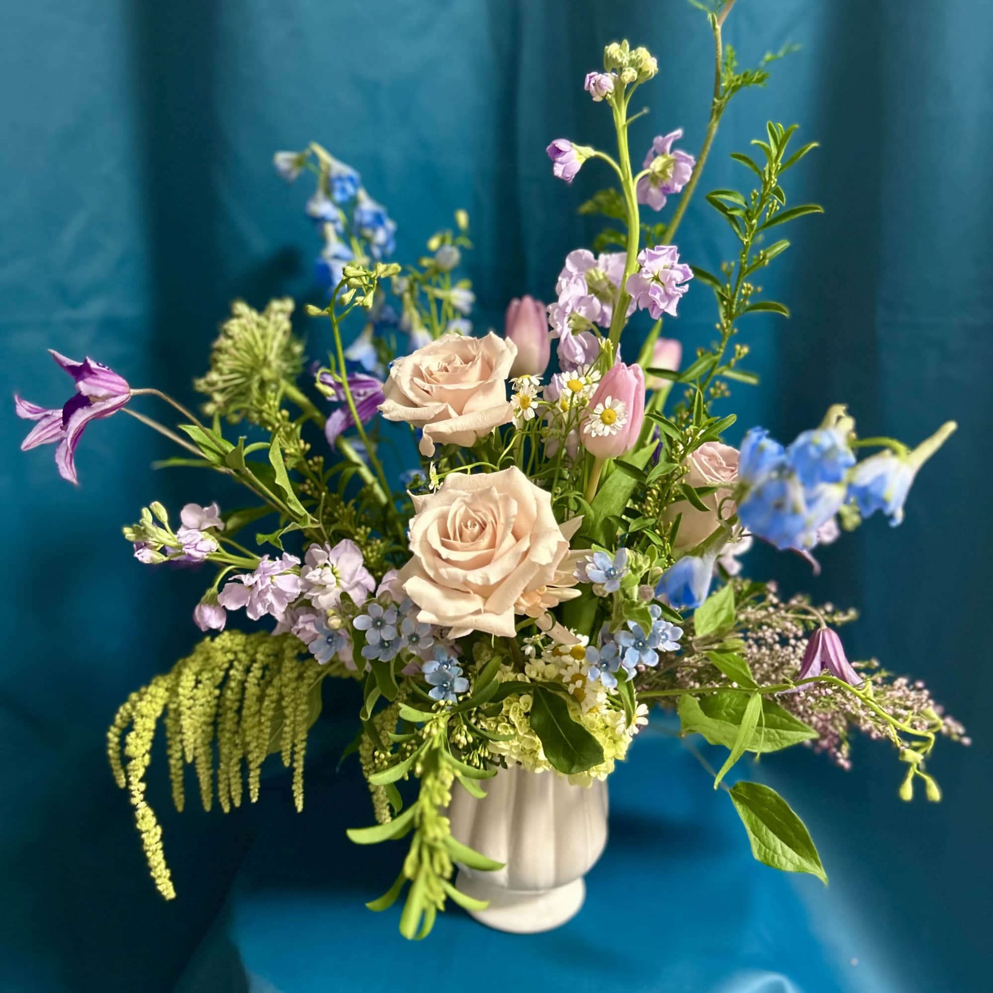 Soft hues of peachy pink, buttery yellow and lavender are the stars