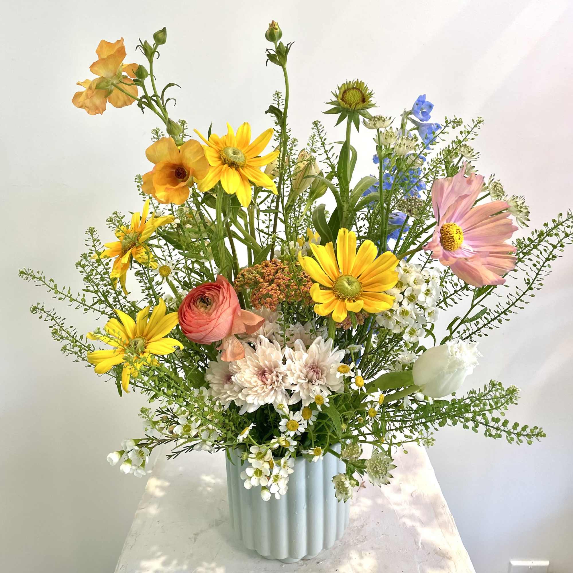 Experience the art of floristry with our Designer&rsquo;s Choice Floral Arrangement. Our