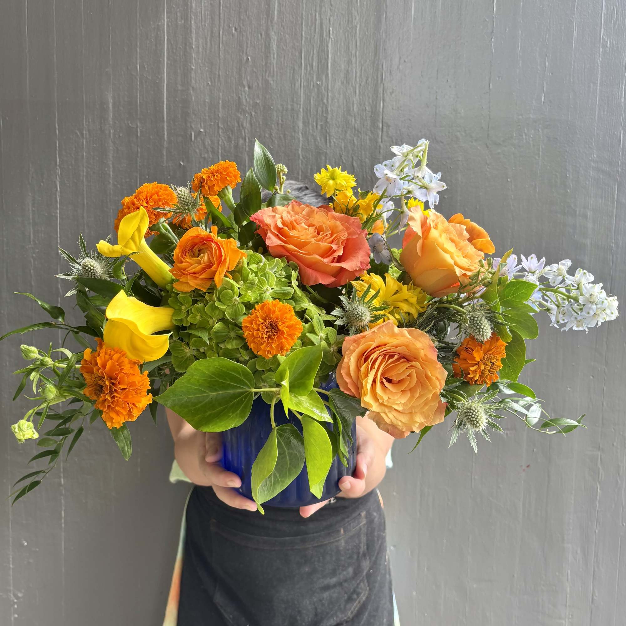 YELLOW, GREEN AND BLUE FLOWERS IN VASE.

Bright, joyful and fresh. This colorful