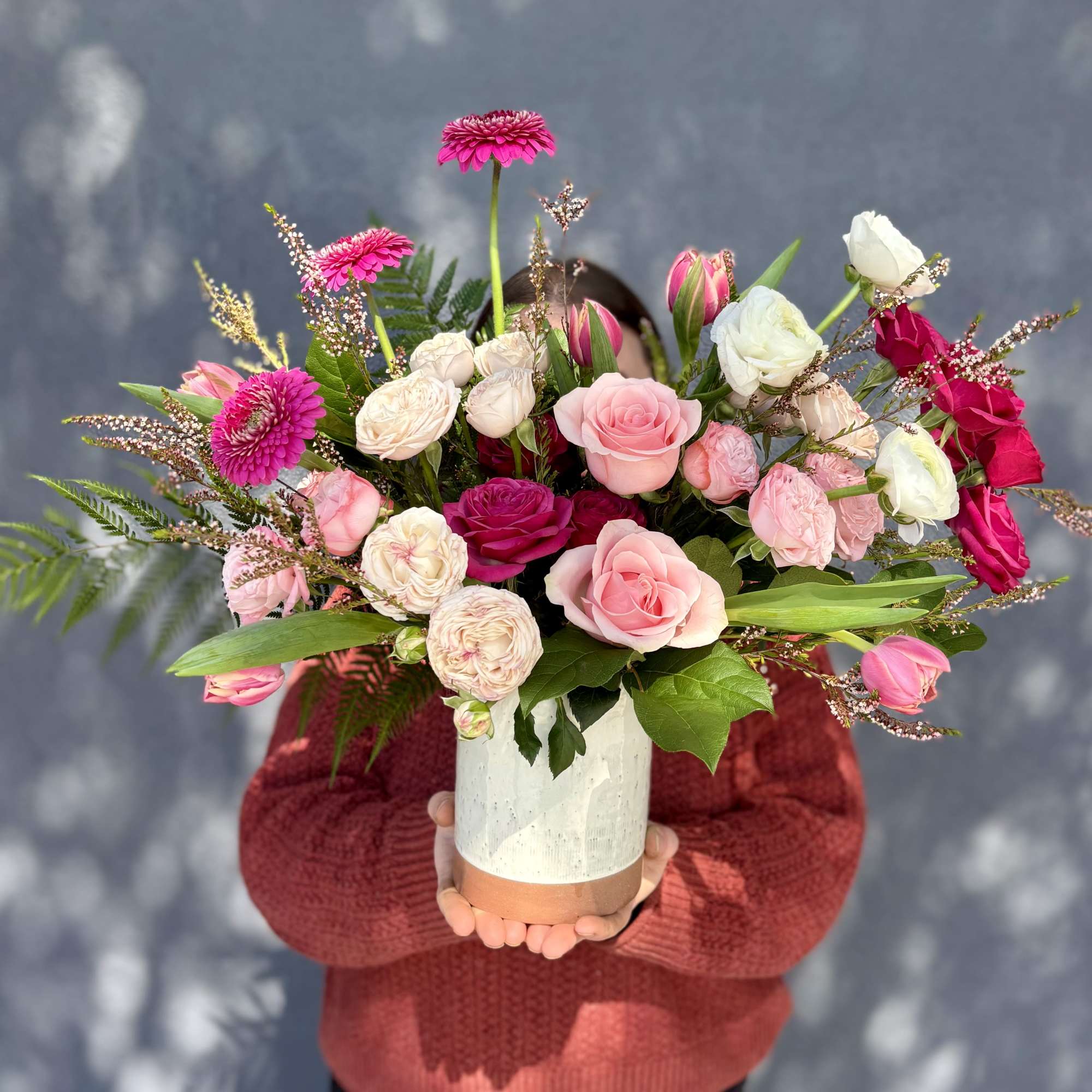 A dainty arrangement full of high quality blooms. A perfect arrangement for