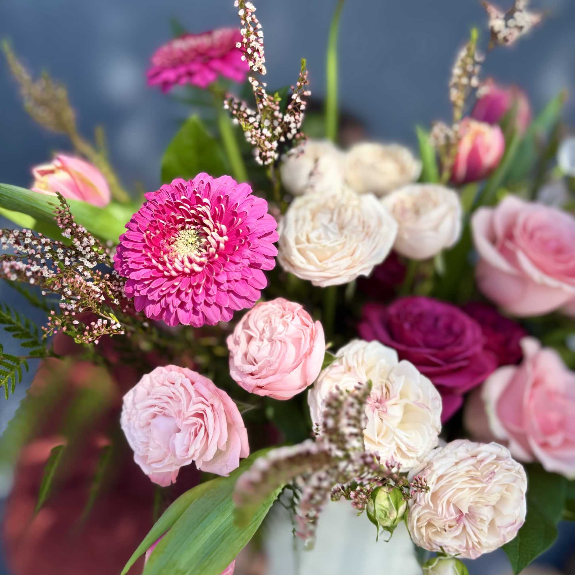 A dainty arrangement full of high quality blooms. A perfect arrangement for