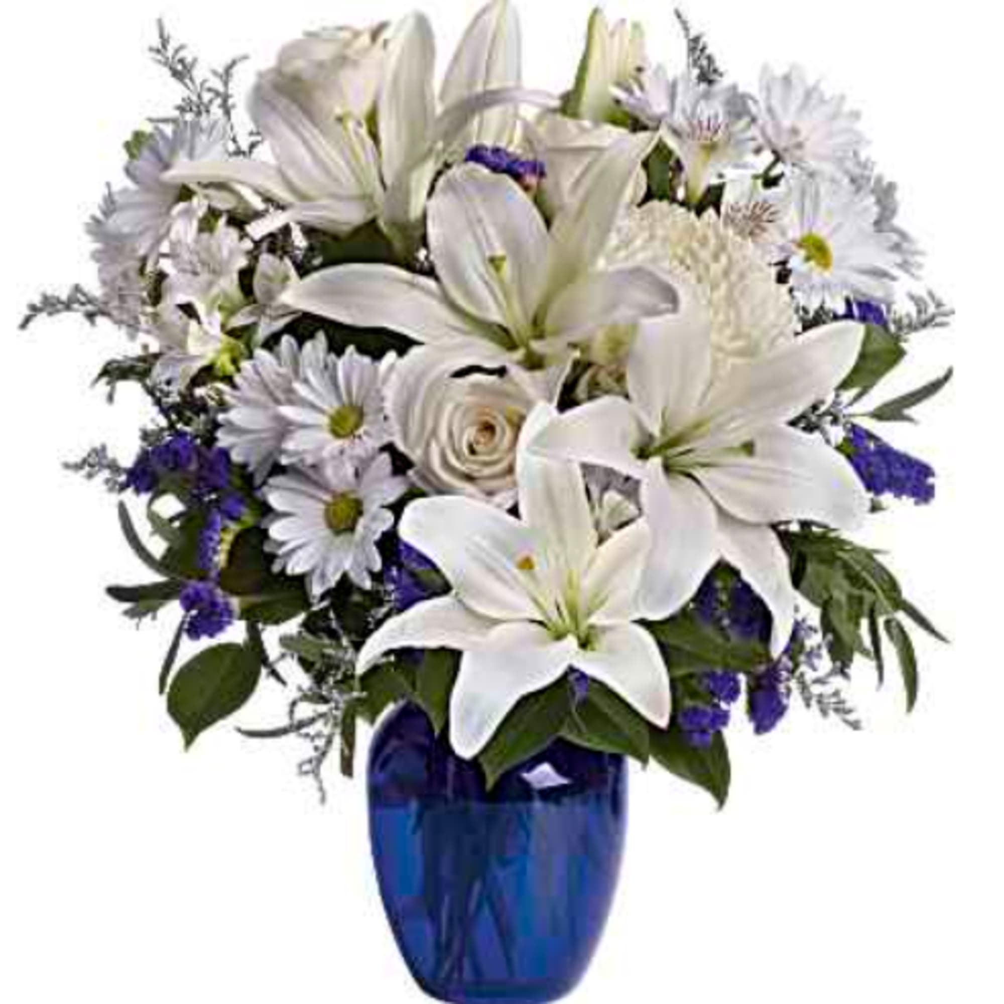 Beautiful blooms such as cr&egrave;me roses, white lilies and alstroemeria along with