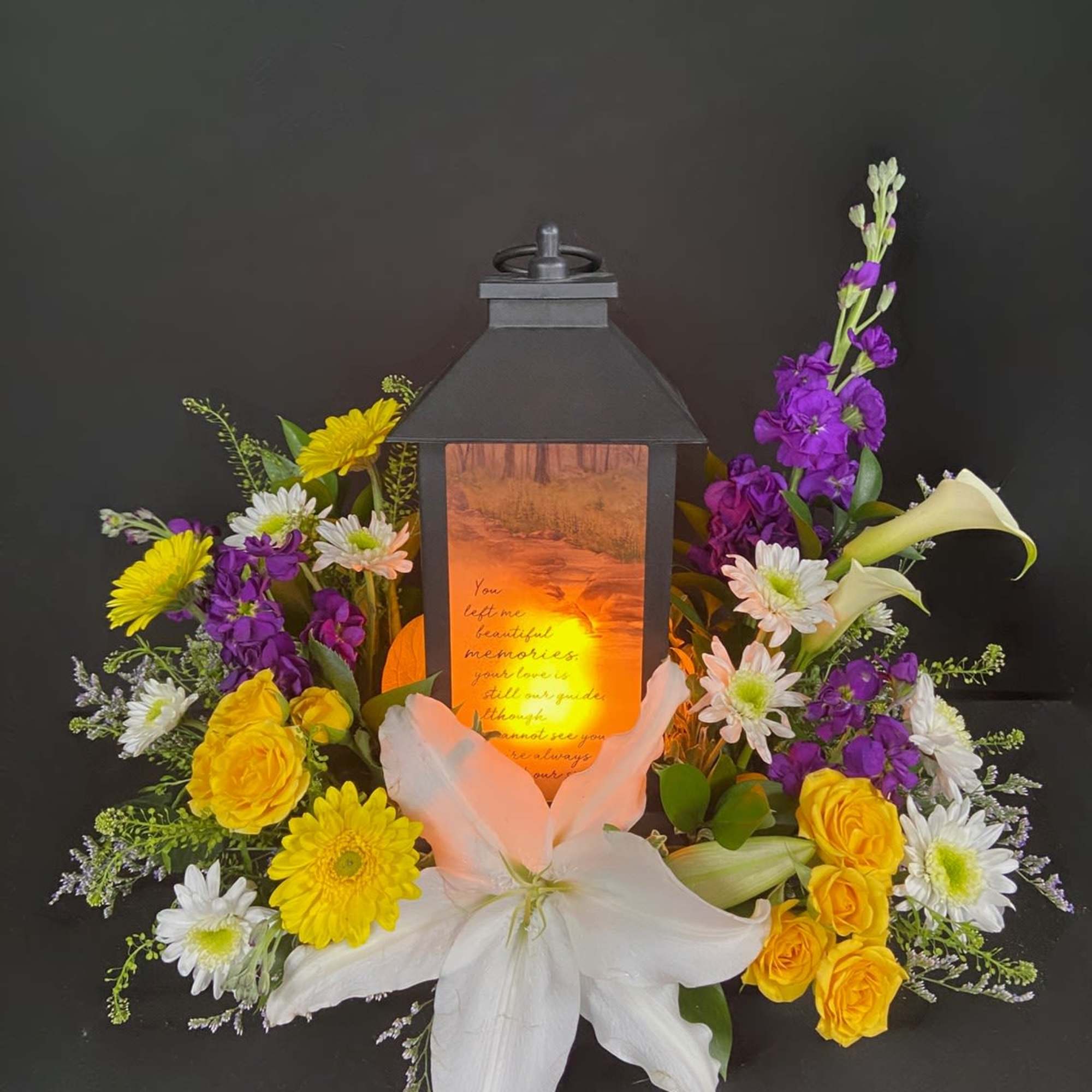 This lantern reads "You left me beautiful memories, your love is still