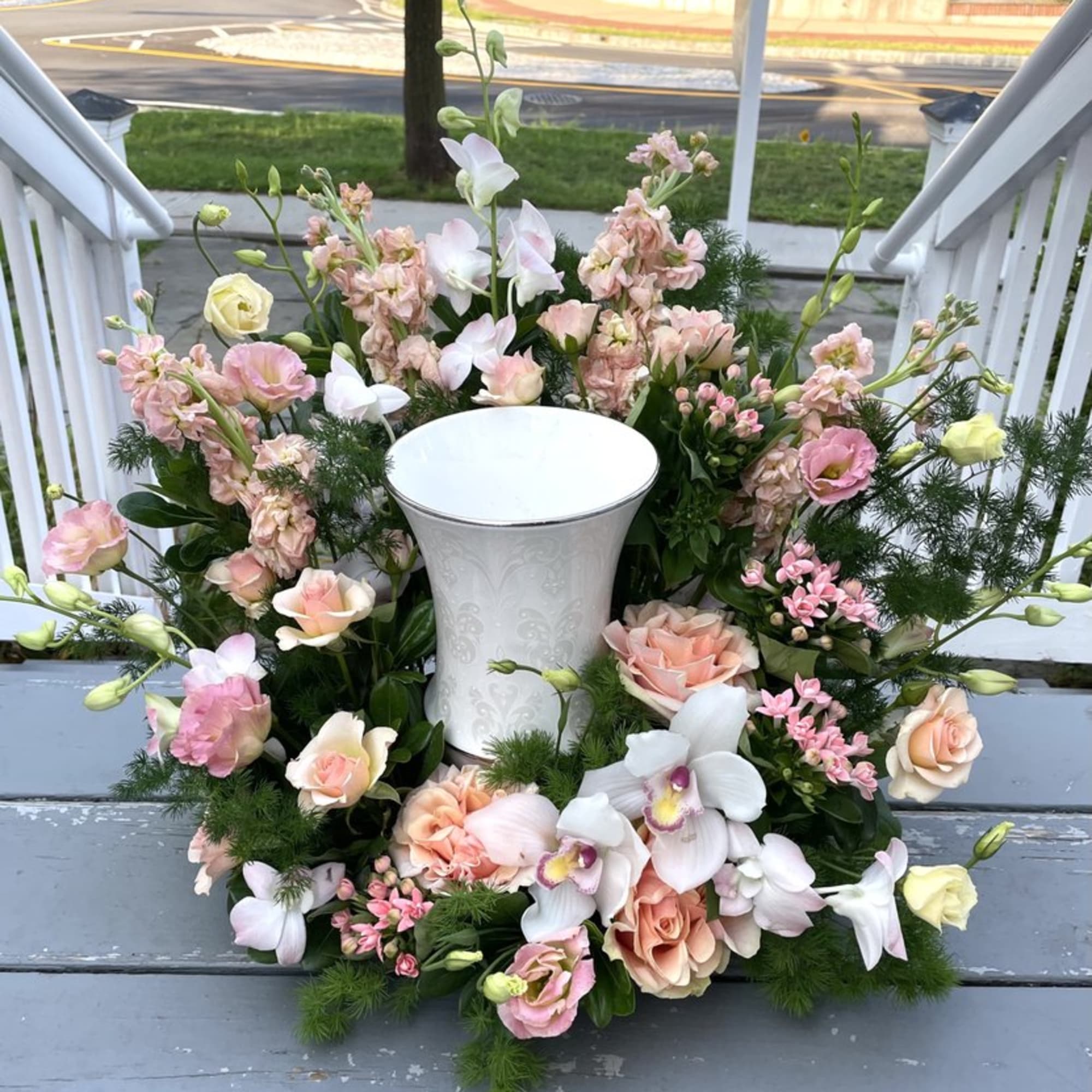 Honor a beautiful life with our Eternal Bloom Urn Surround, a gracefully