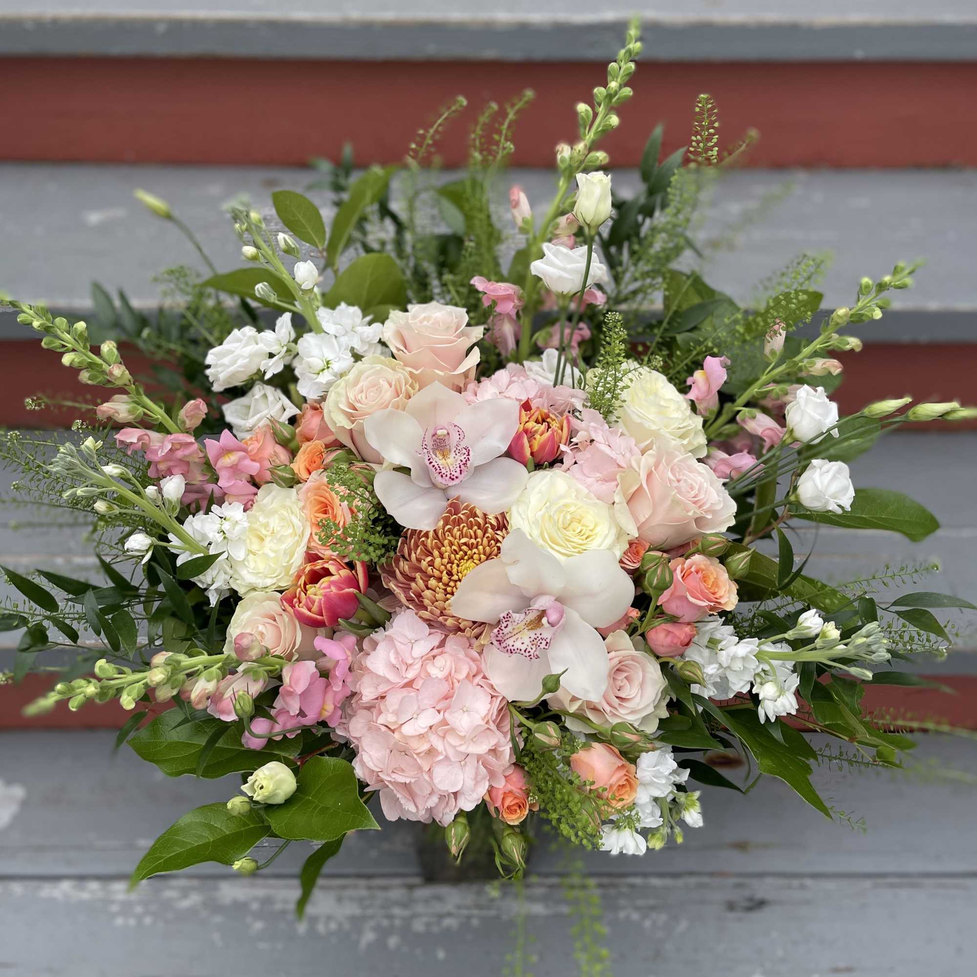 MINIMUM OF 24 HOURS NOTICE. A tall and lush arrangement for a