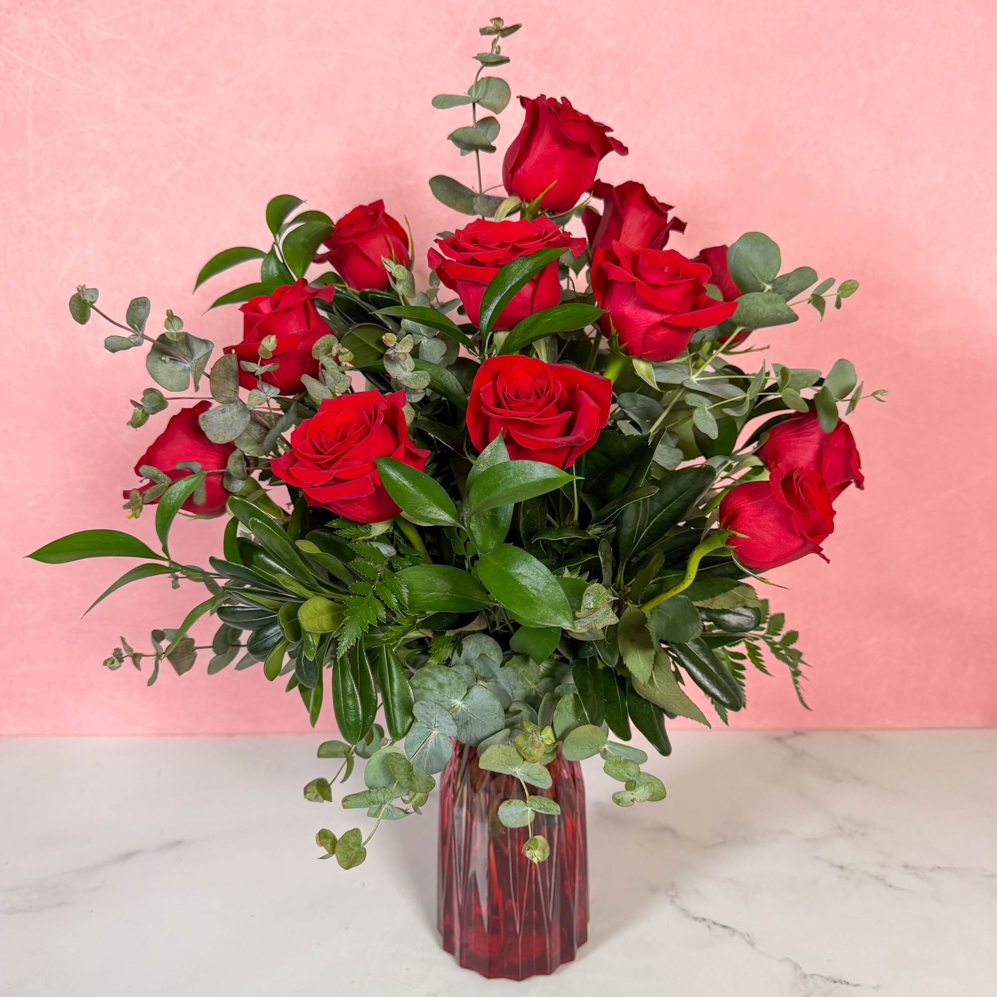 If you're looking for an elevated twist on one dozen red roses