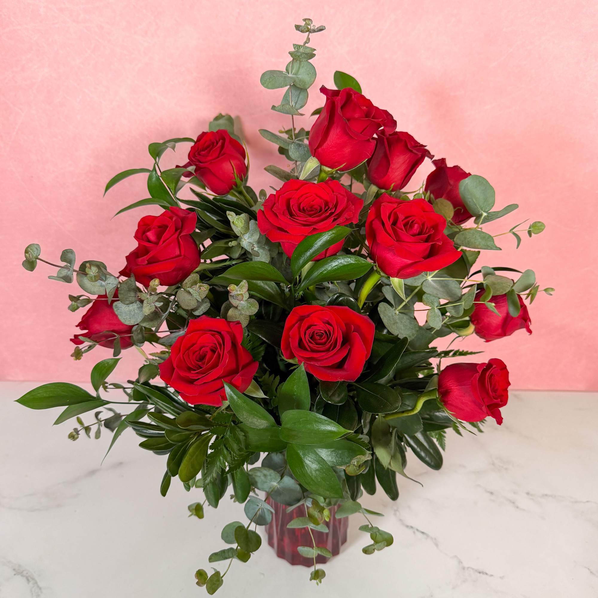If you're looking for an elevated twist on one dozen red roses
