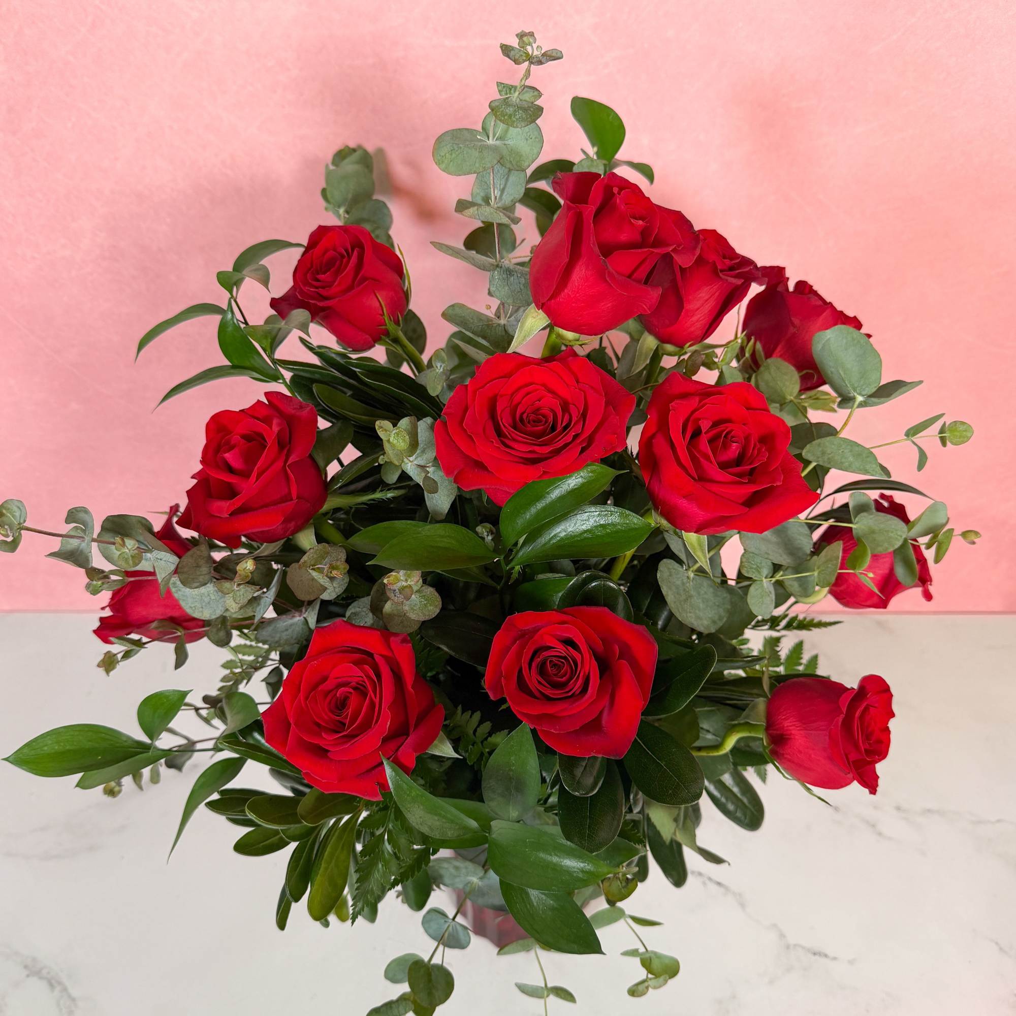 If you're looking for an elevated twist on one dozen red roses