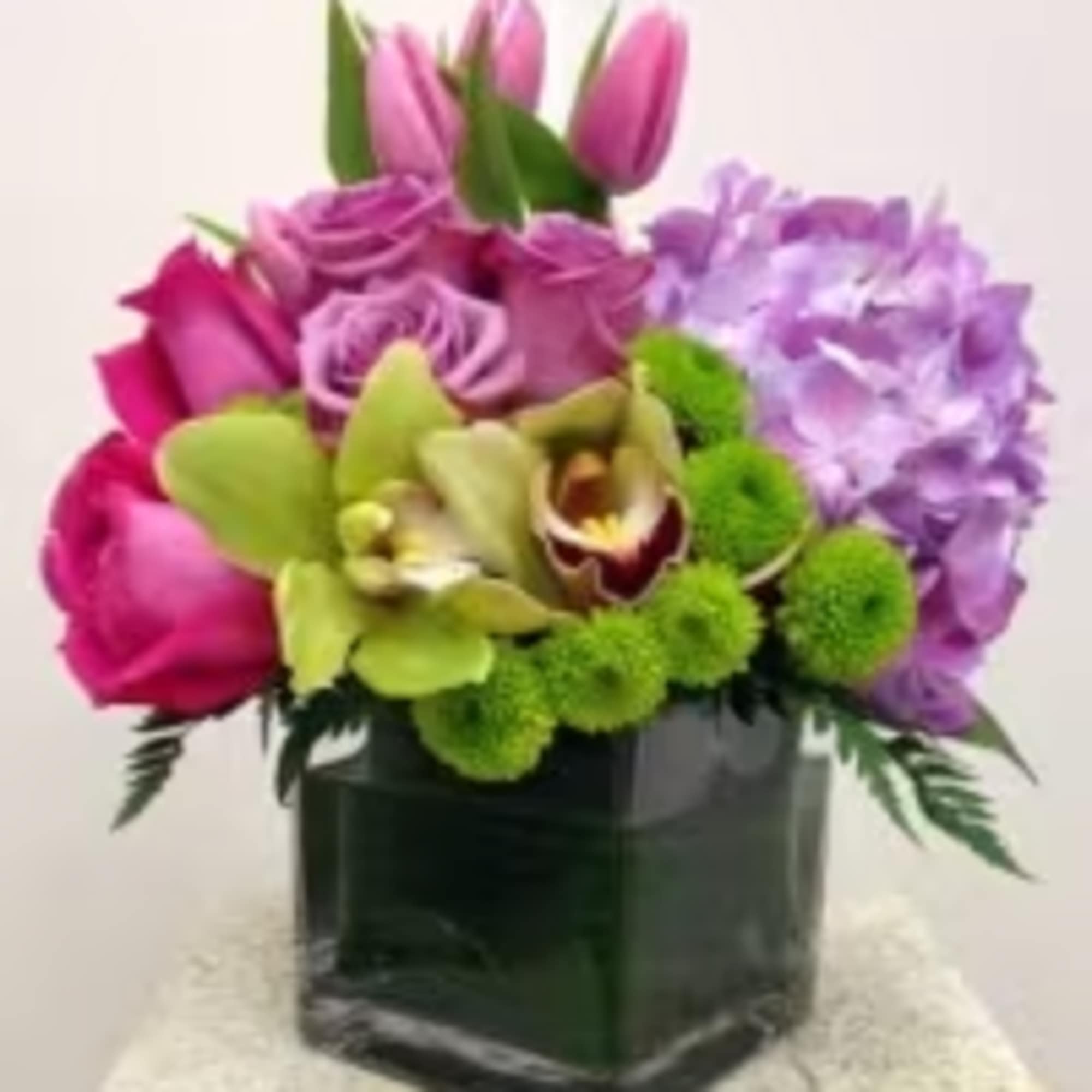 Vibrant and Bright!! This arrangement if bright &amp; colorful and designed in