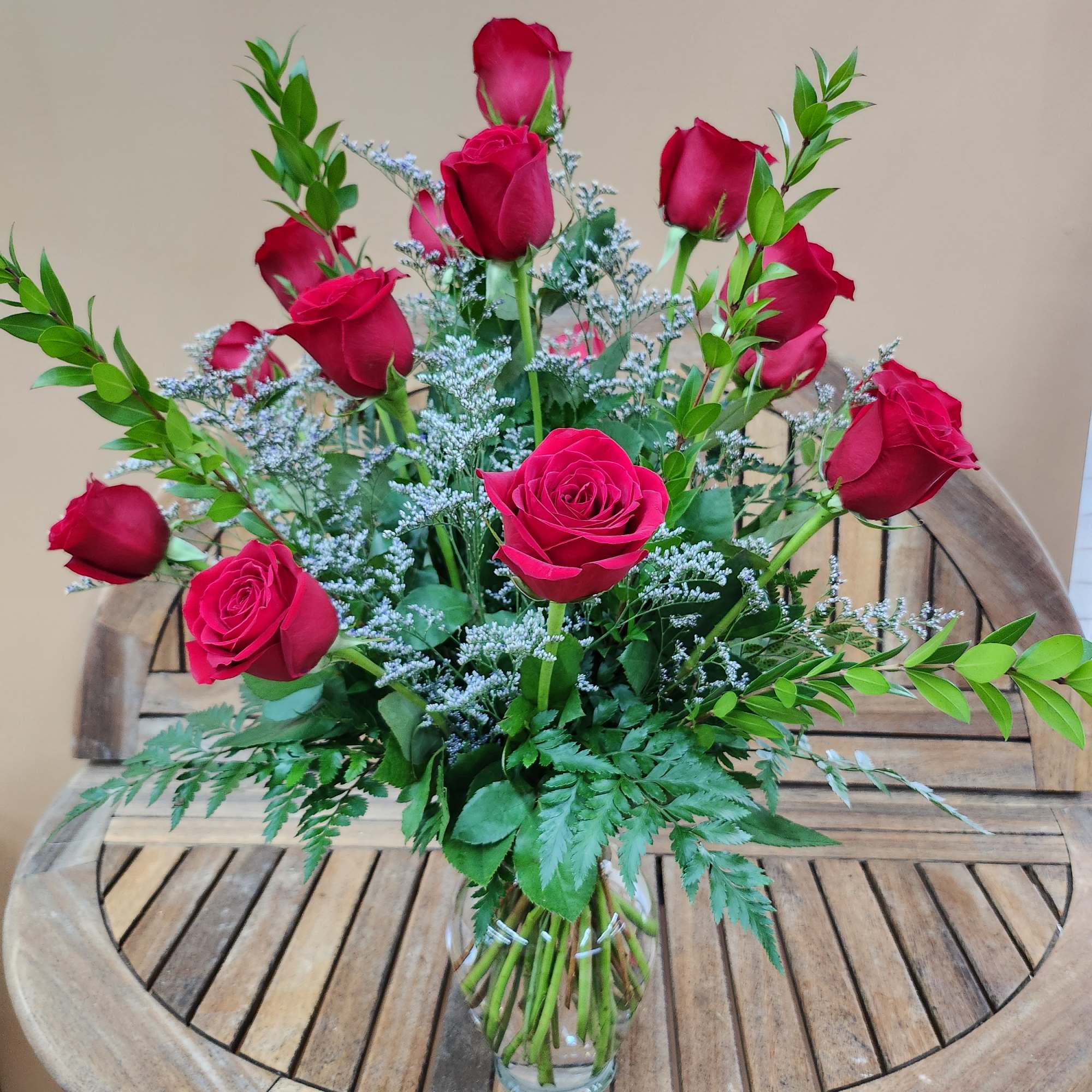 18 Red Rose With Caspia and Mixed Greens 