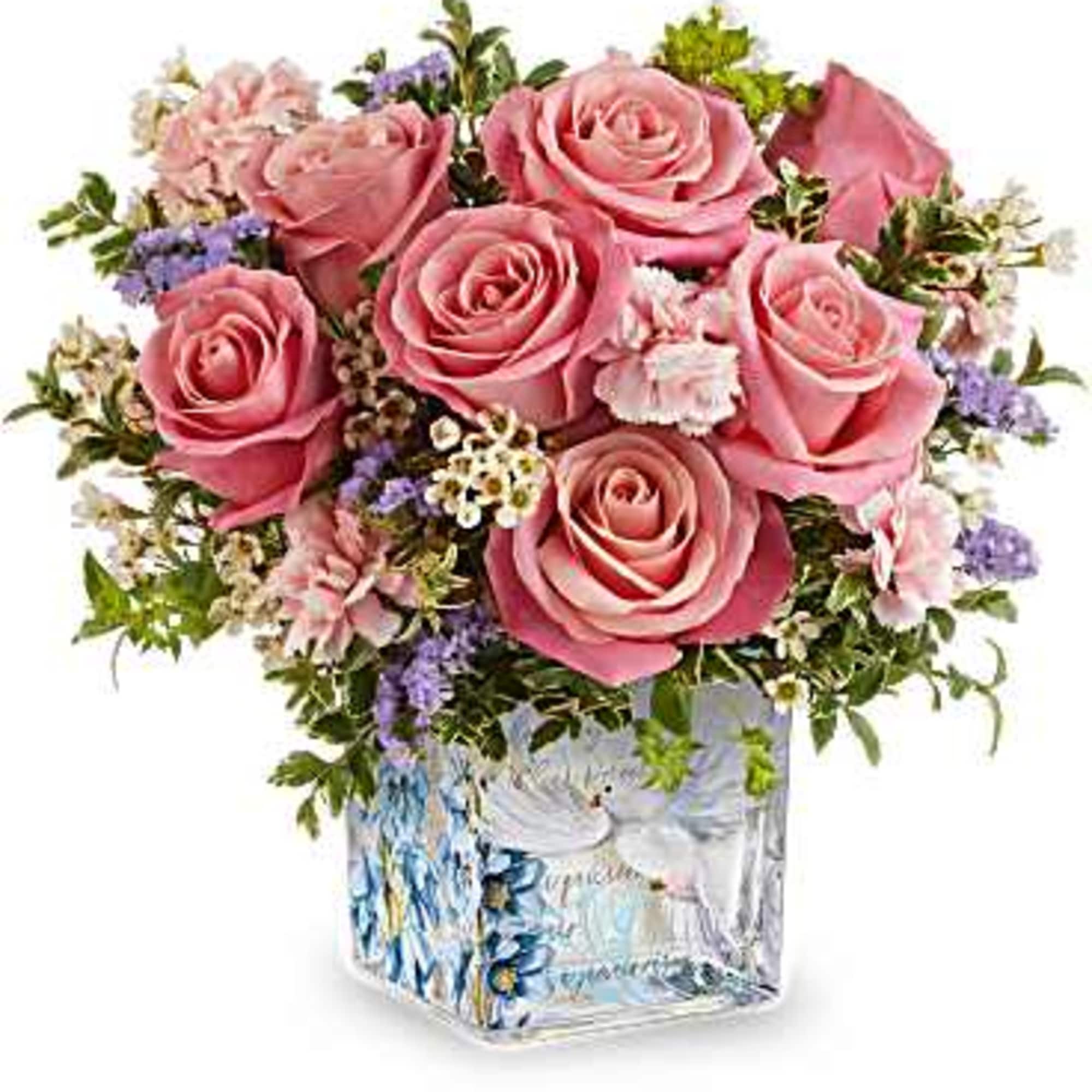 Softly serene, Teleflora's Whispers of Grace Bouquet blends pink roses and delicate