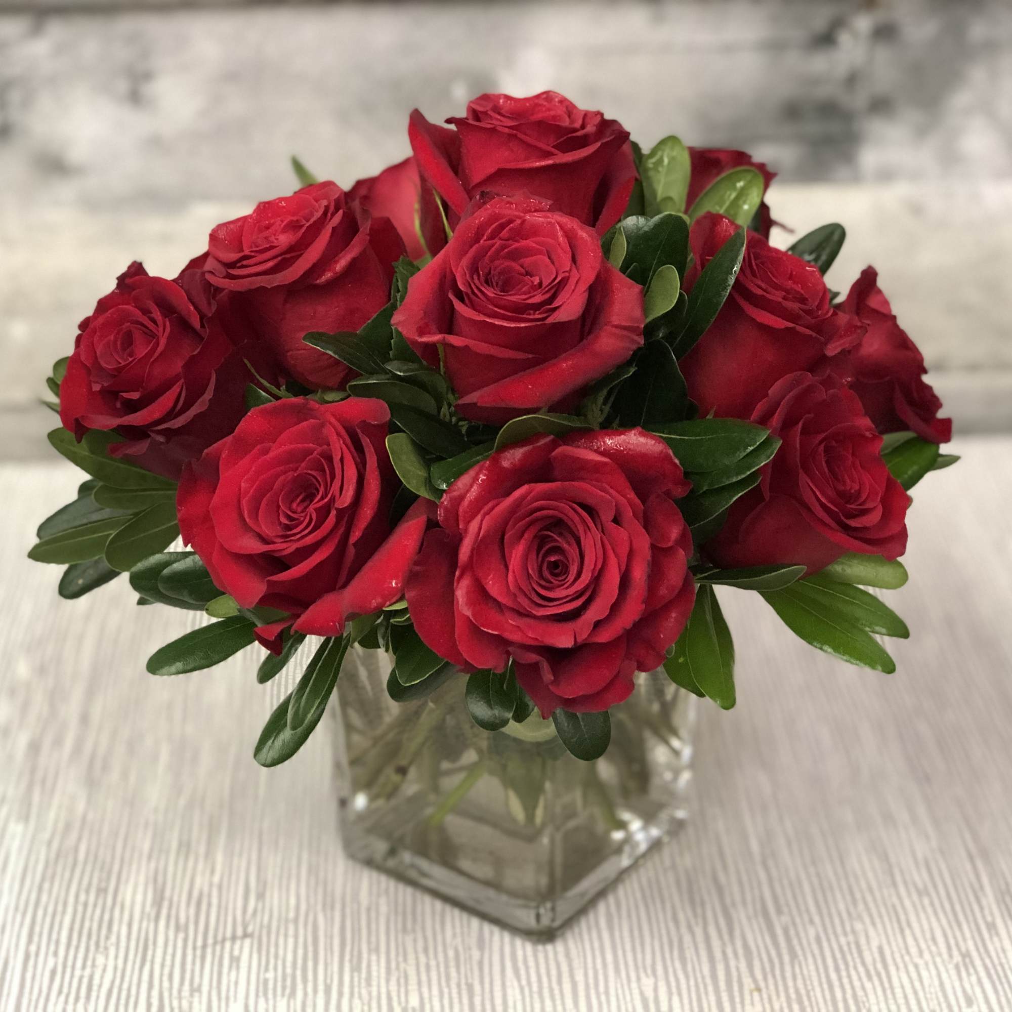 A modern version of a dozen roses, this versatile design is fit