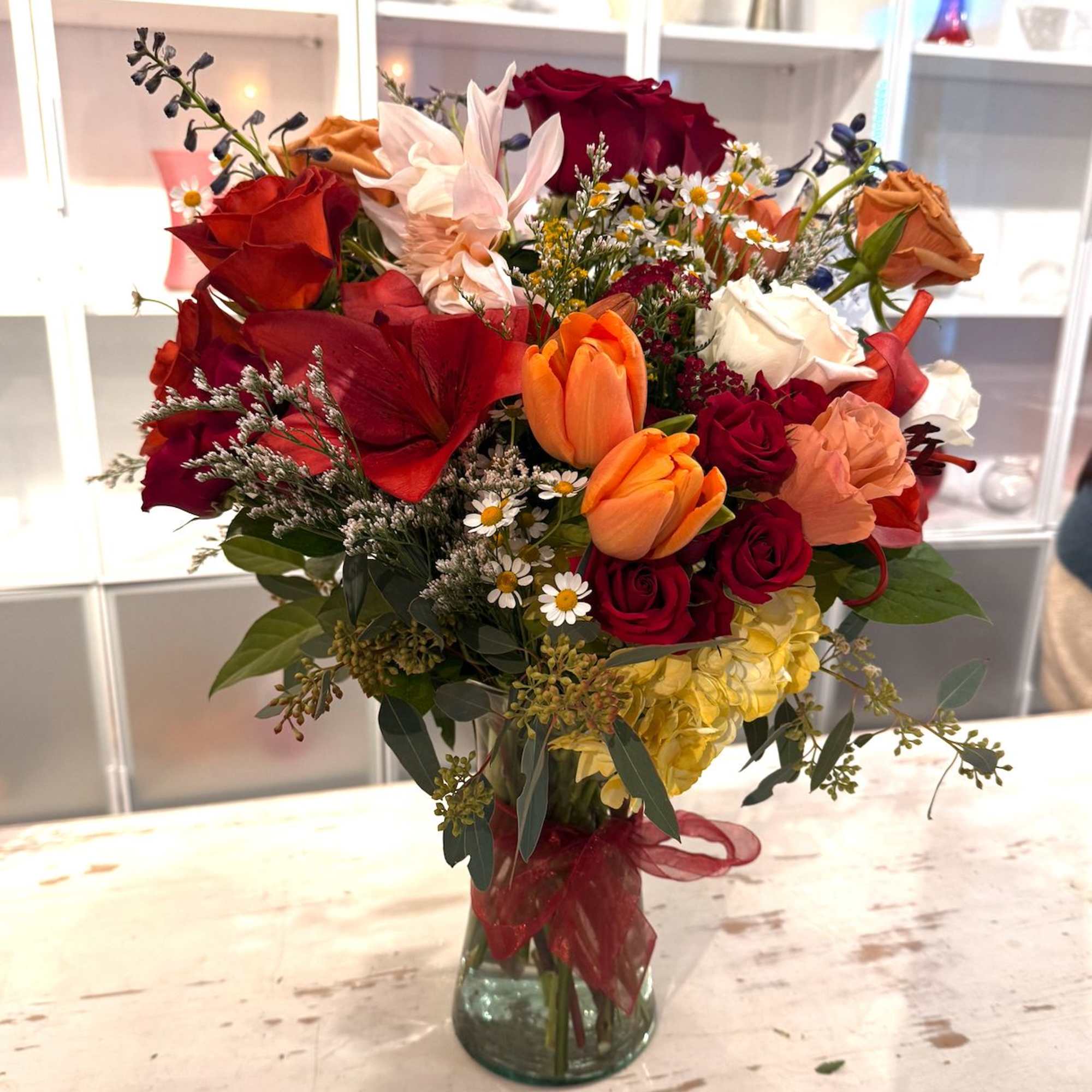 This country wildflower&ndash;inspired arrangement brings the charm of open fields and simple