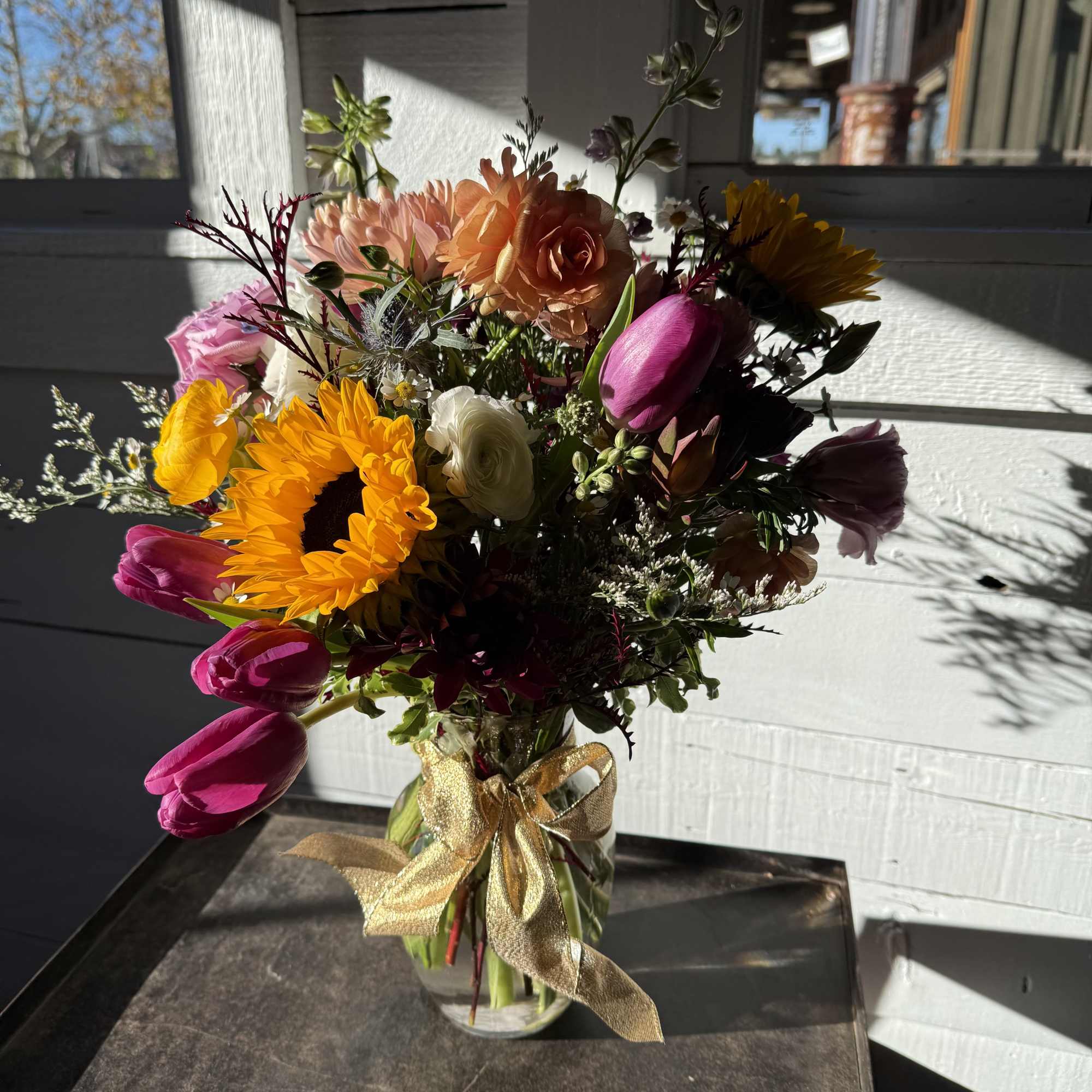 This country wildflower&ndash;inspired arrangement brings the charm of open fields and simple