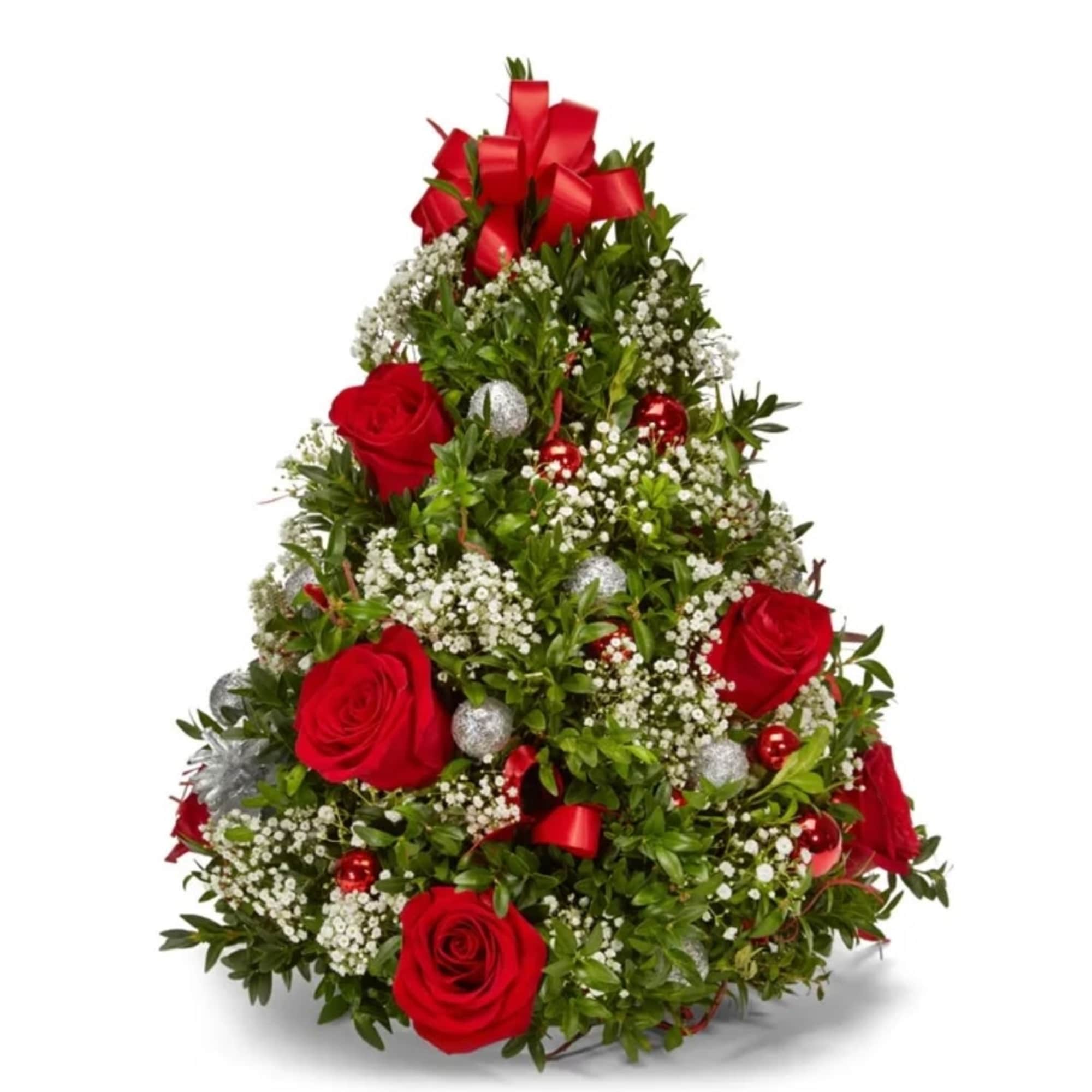 Vibrant red roses, delicate white baby's breath, lush seasonal greens, mini silver
