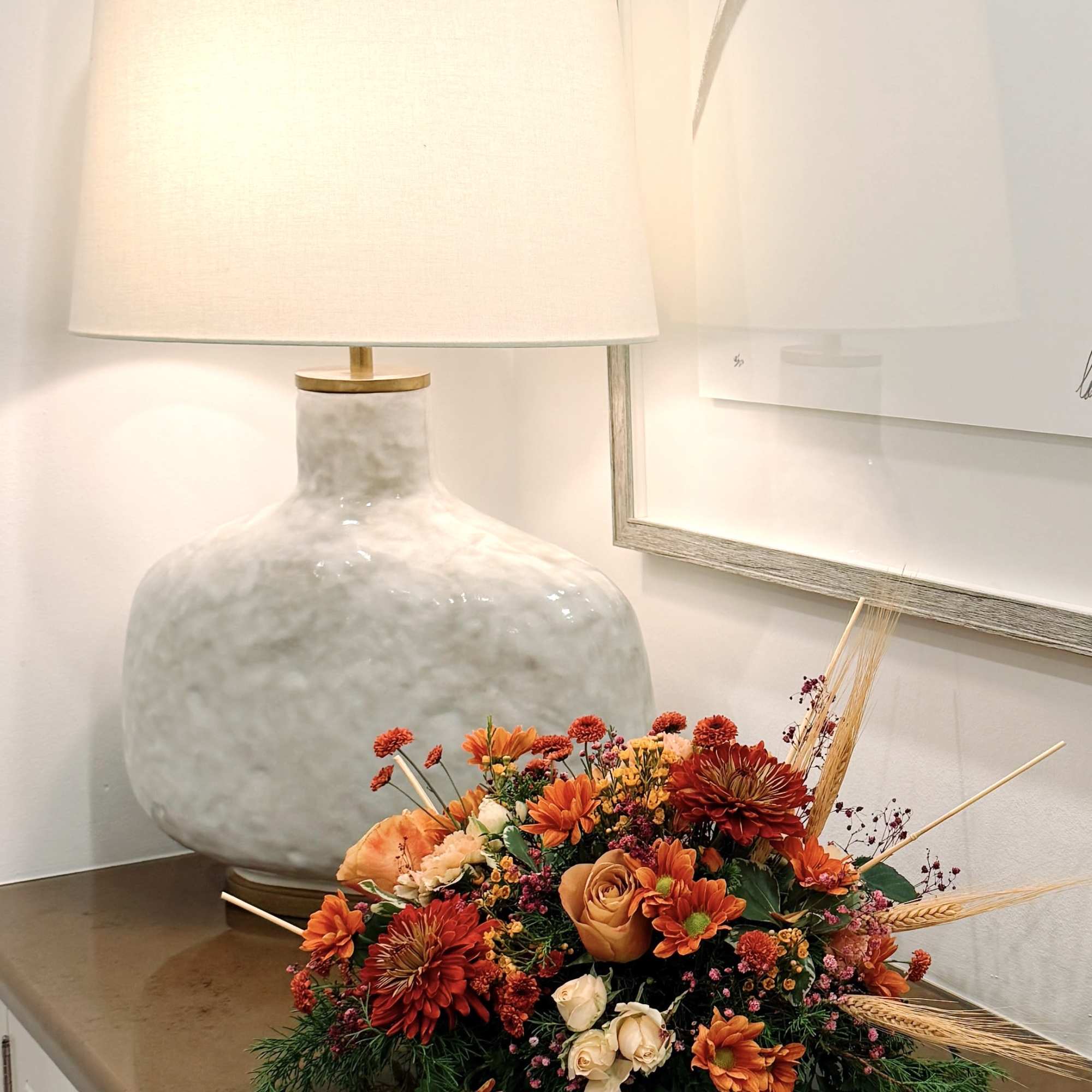 This floral design features a carefully structured composition in warm tones, ideal