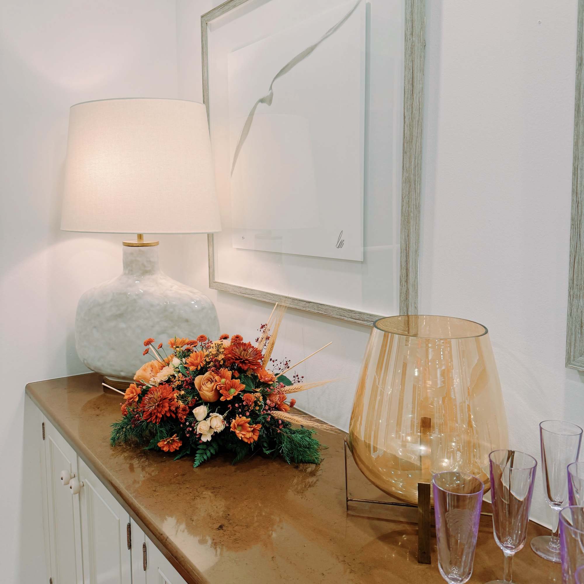 This floral design features a carefully structured composition in warm tones, ideal